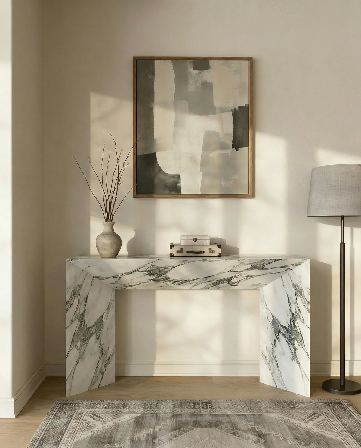 Arabescato marble waterfall console table in an entryway