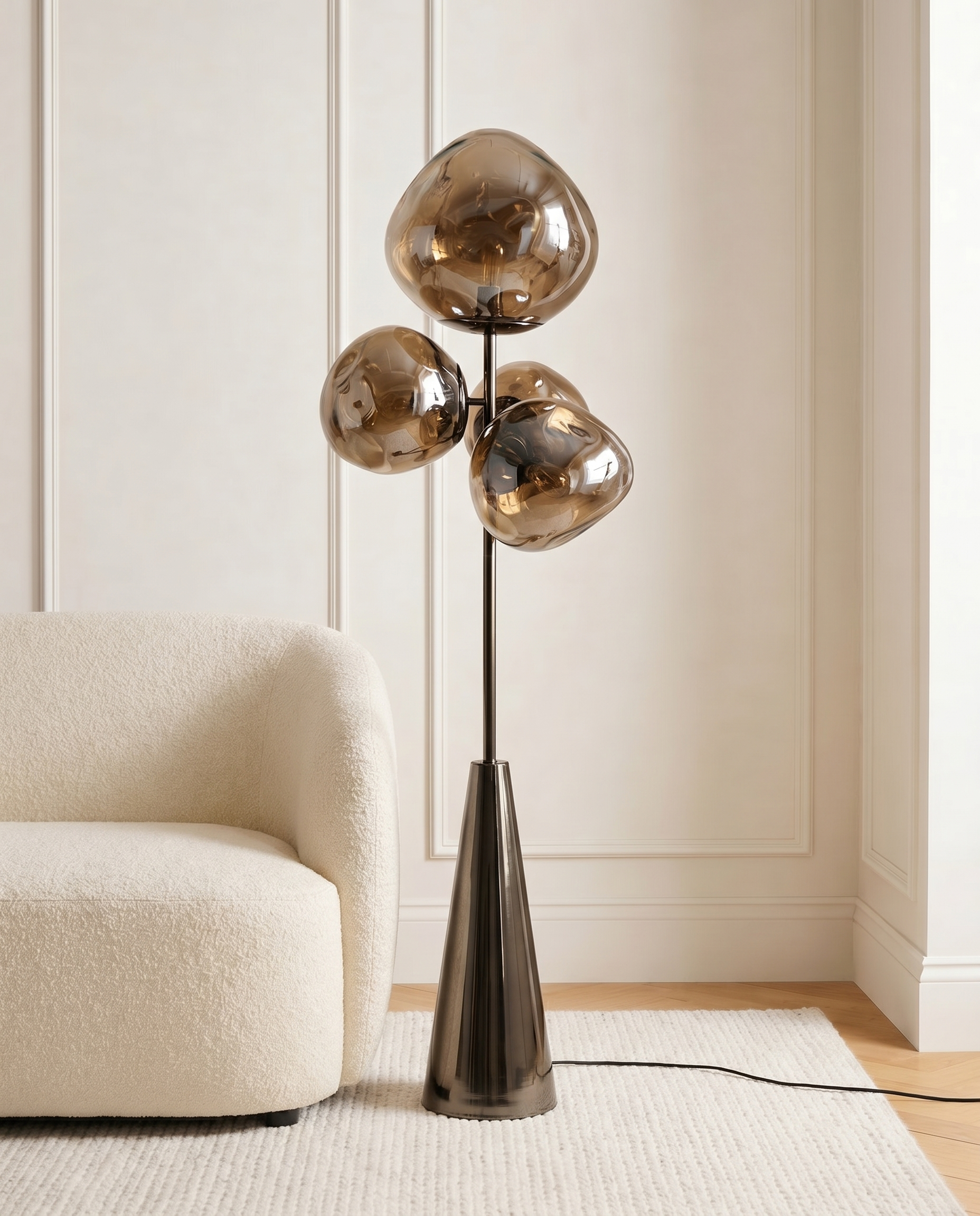 Amber glass orb floor lamp on metallic stem