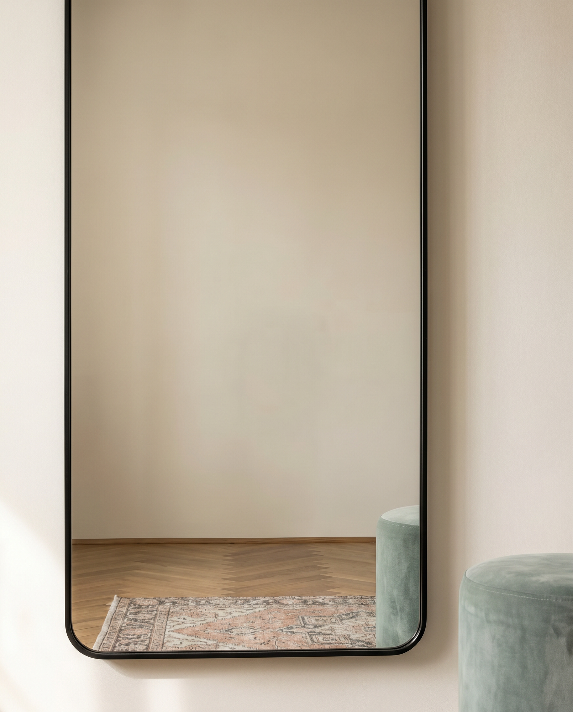 Rowan black full-length mirror, close-up of the rounded corner