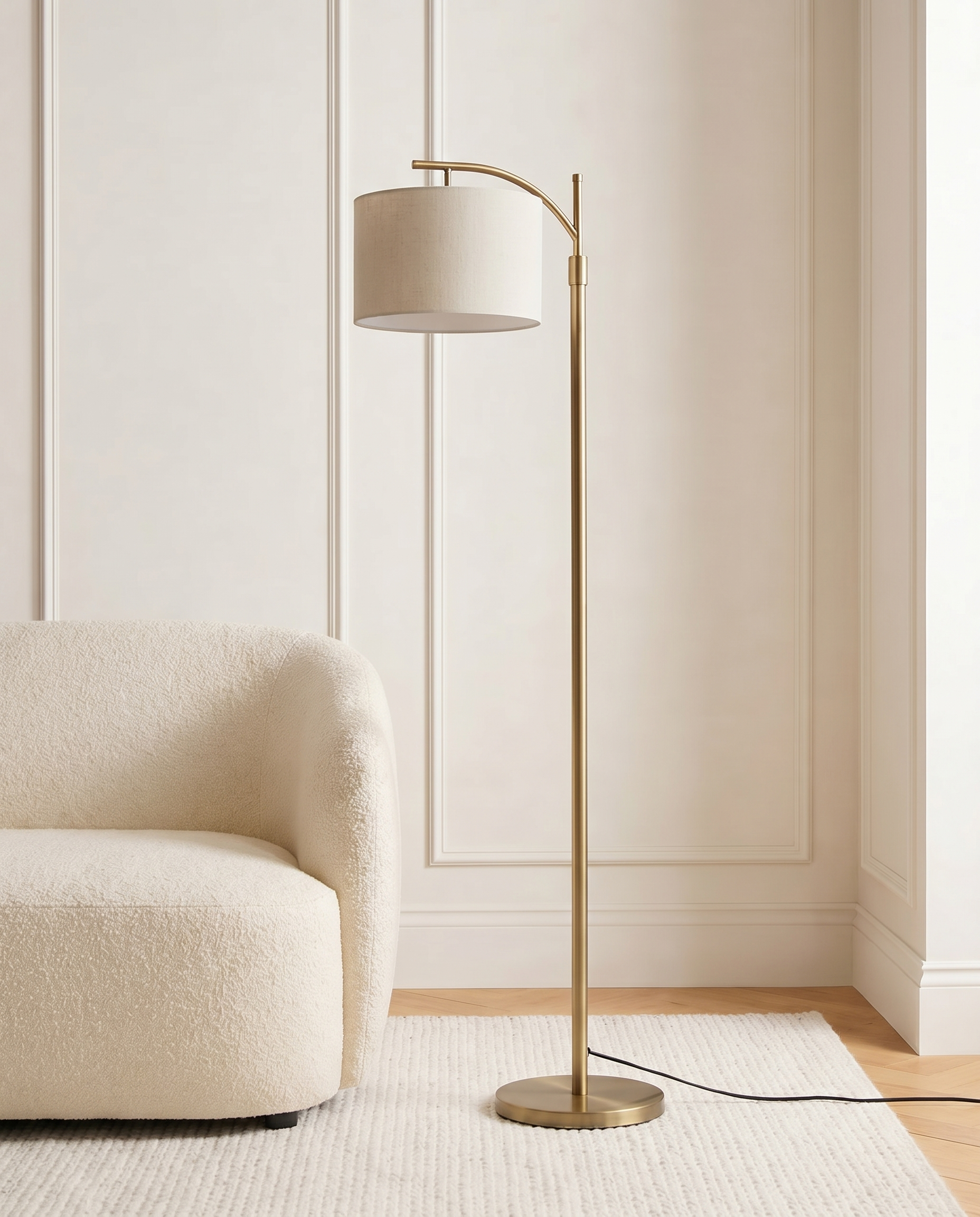 Modern gold floor lamp with off-white shade