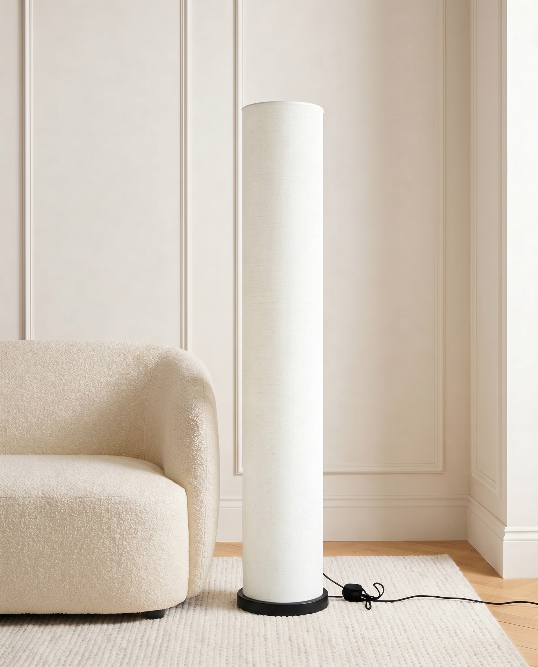 Black floor lamp with off-white shade