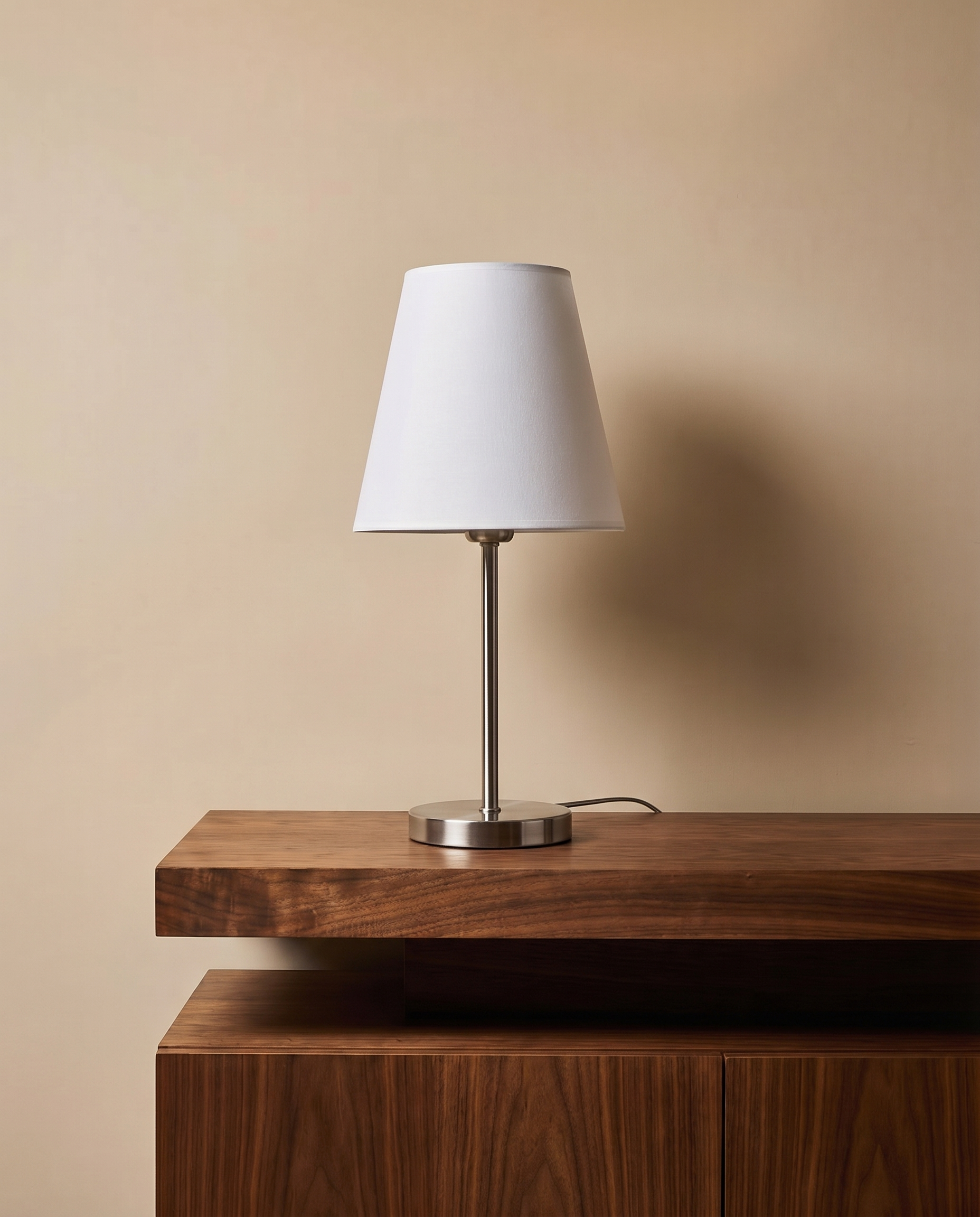 Silver table lamp with off-white shade