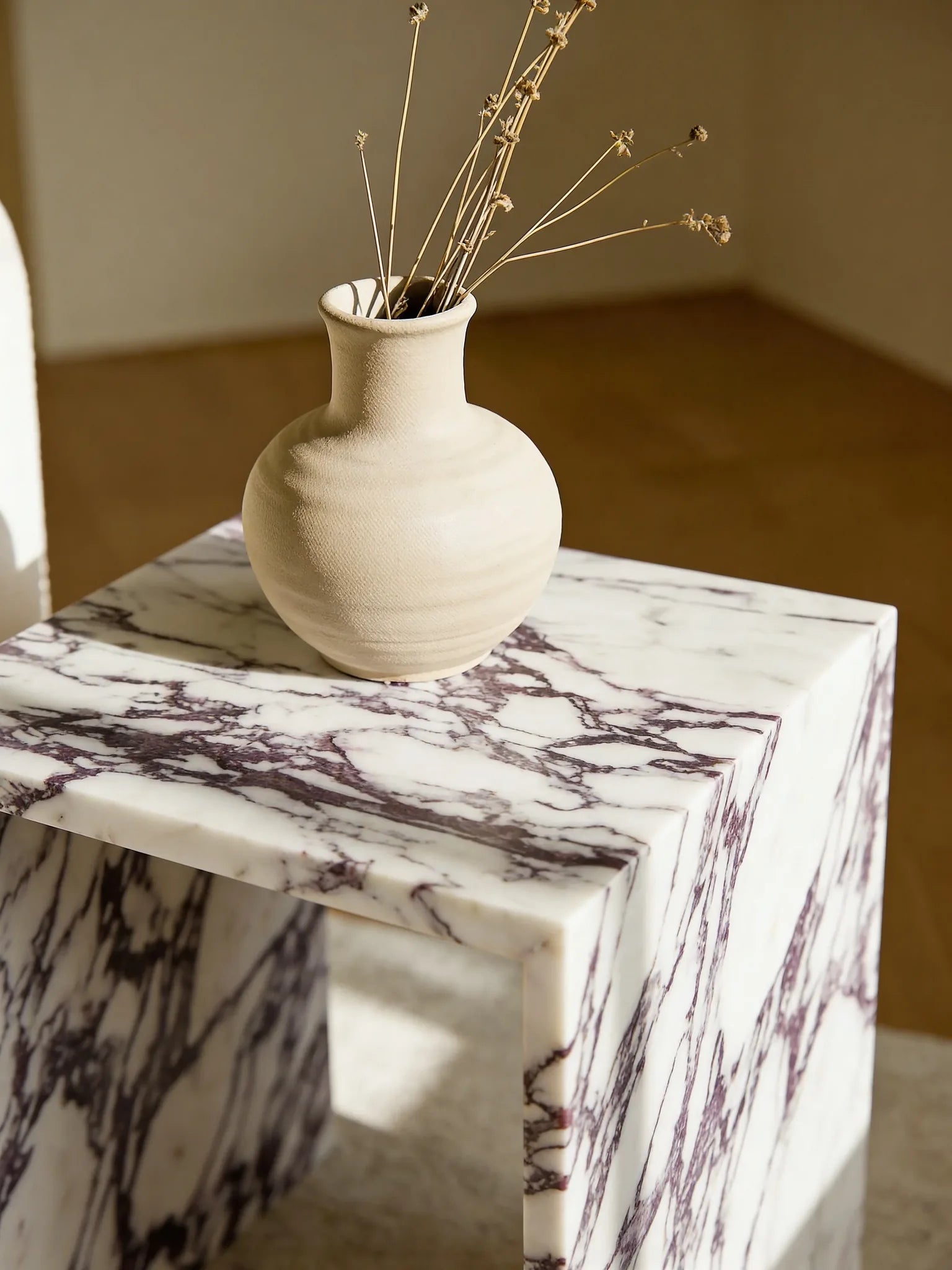 Albert Calacatta marble box side table in a Dubai living room