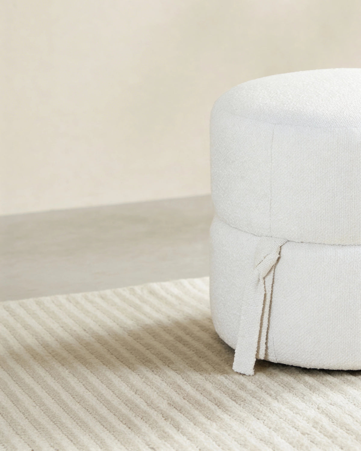 Alpine round pouf, side view