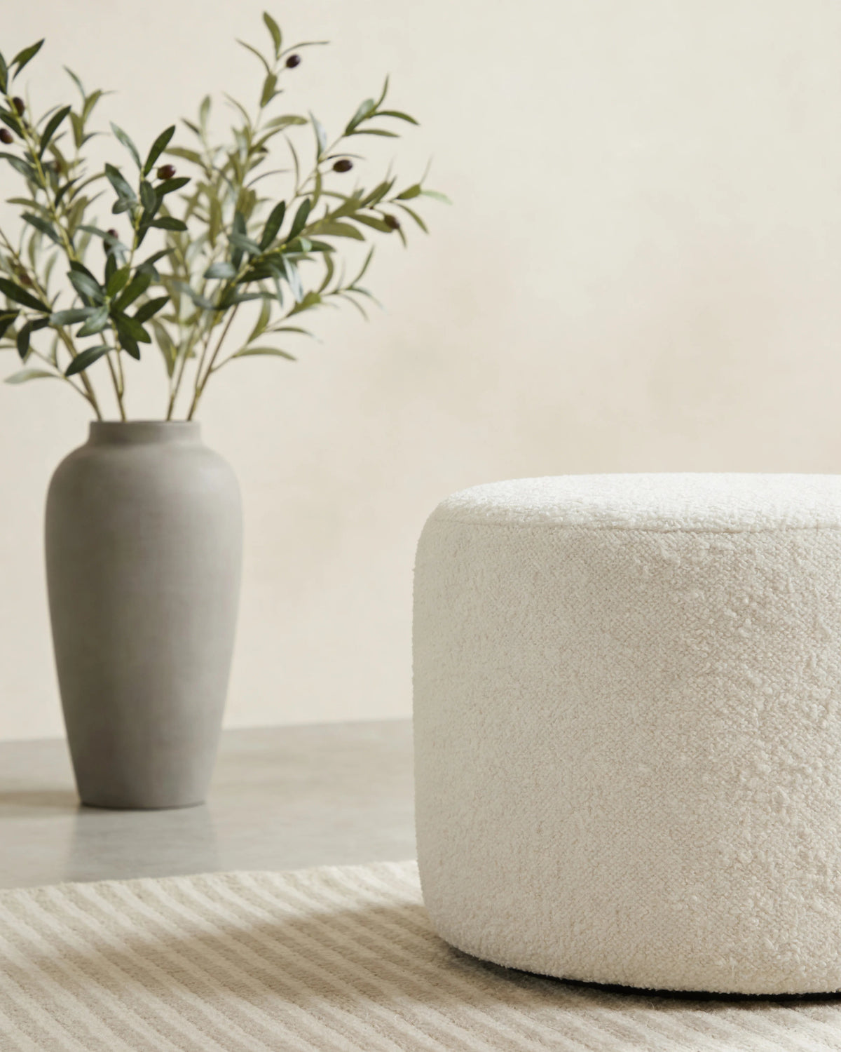 Round modern pouf, close-up of the fabric