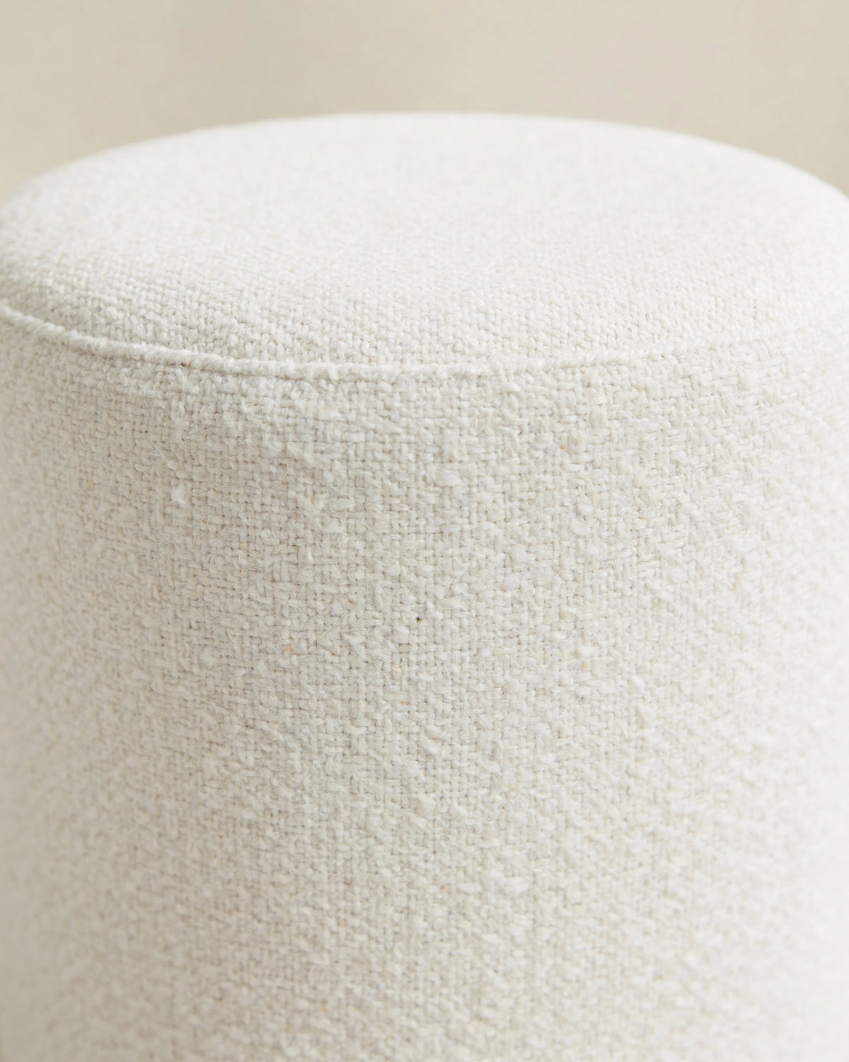 White boho pouf, close-up of the woven texture