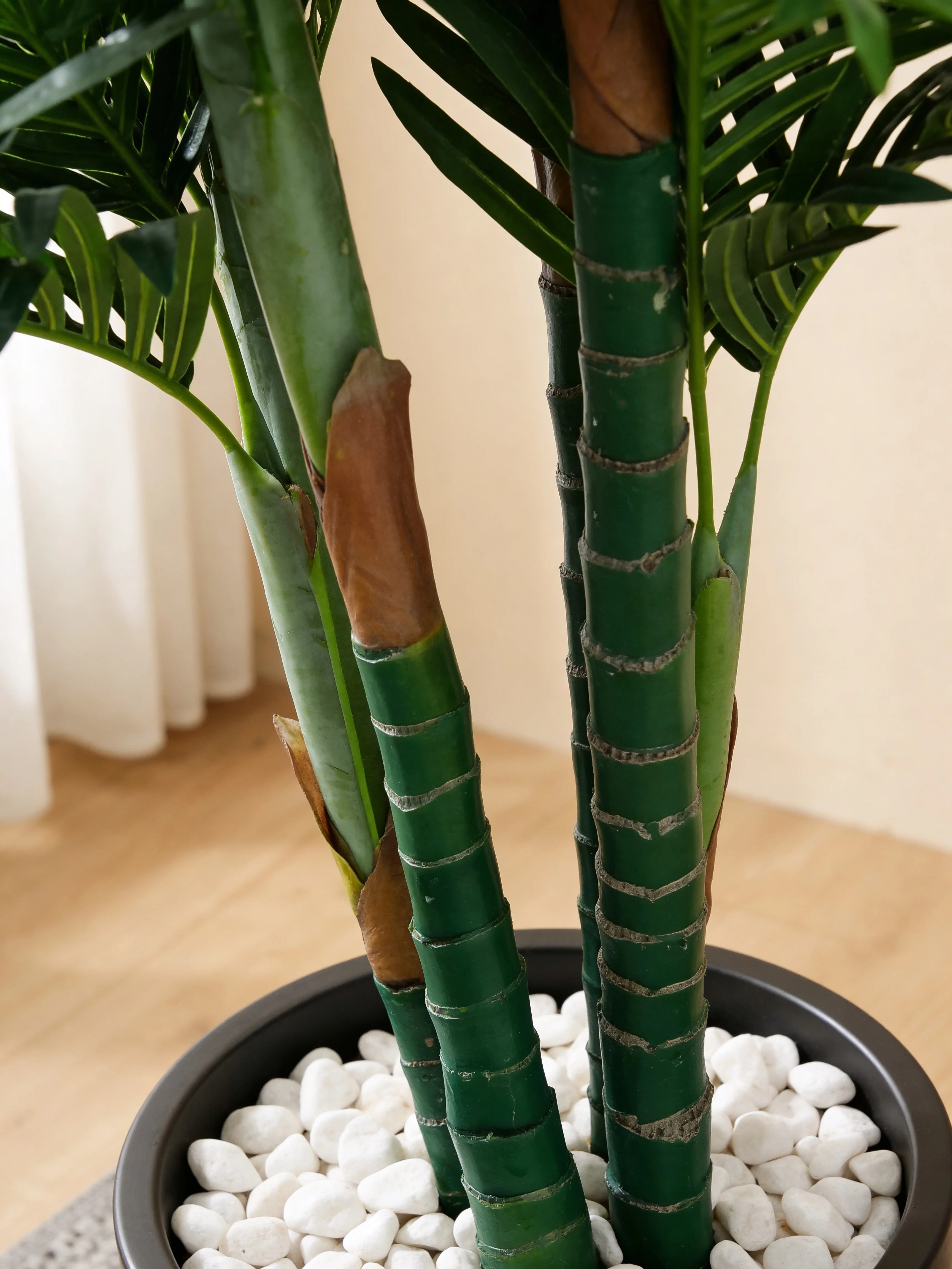 Artificial areca palm tree in a Dubai living room
