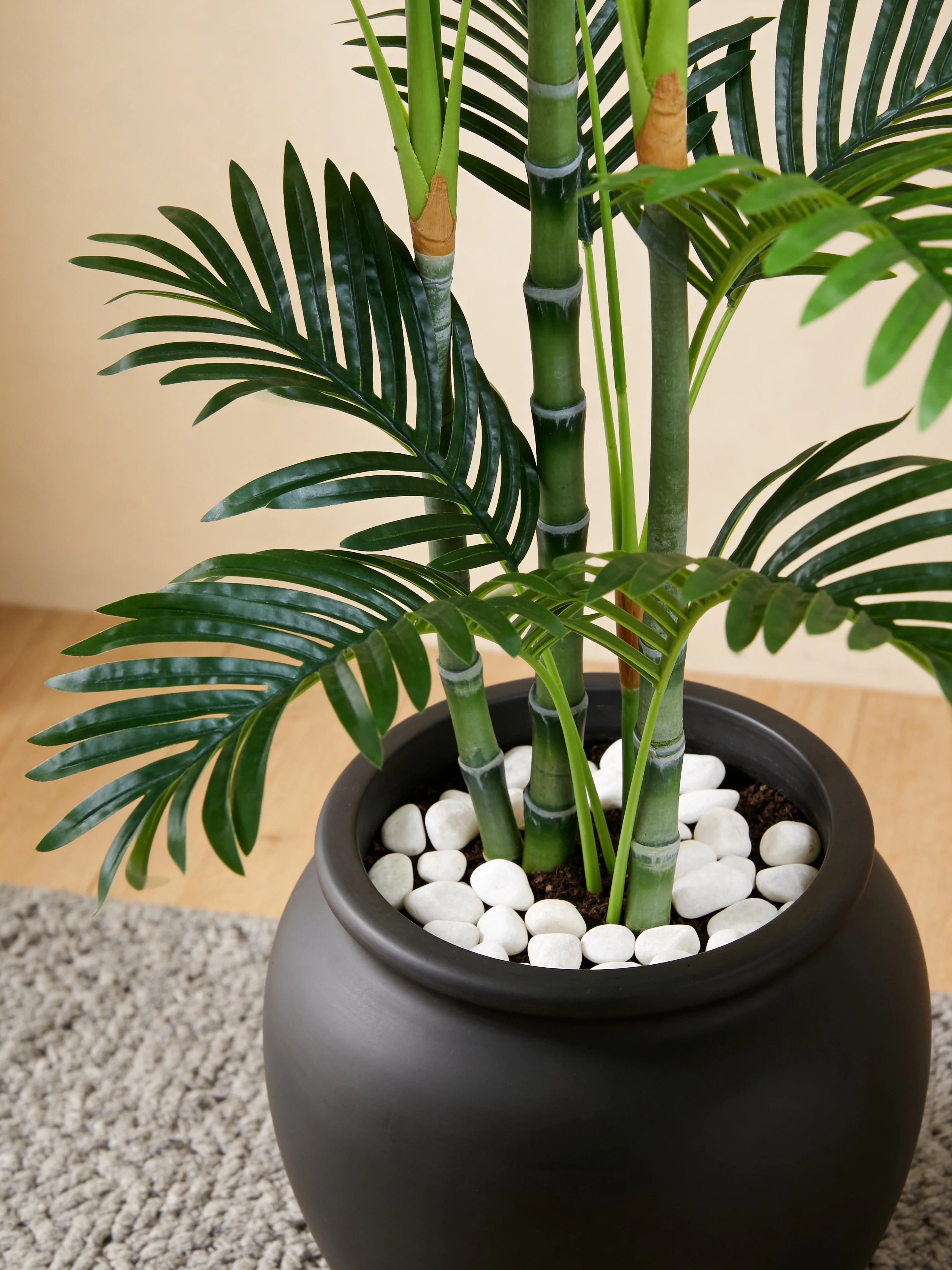 Artificial areca palm plant in a Dubai living room