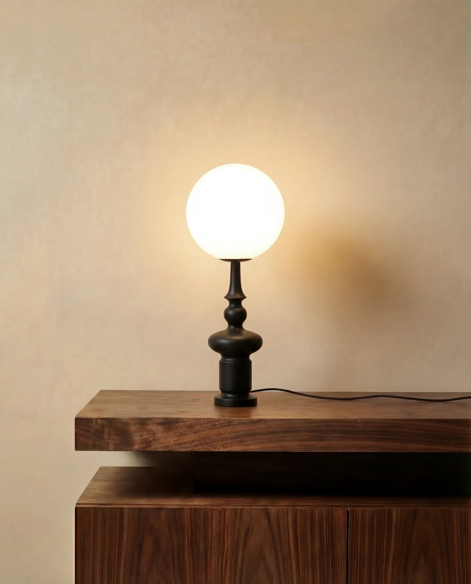 Black Chess Piece Table Lamp in a Dubai living room