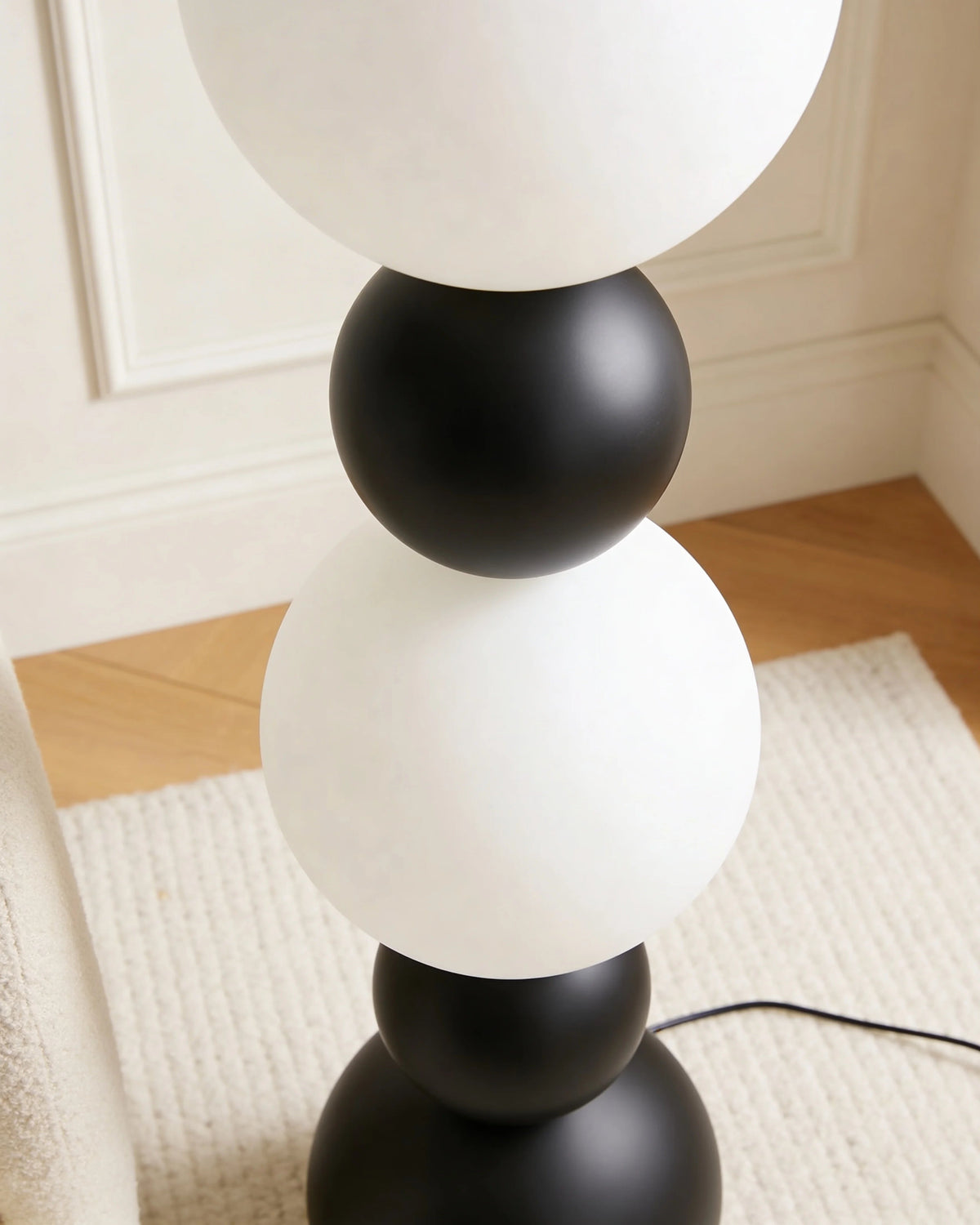Bubble brass floor lamp with frosted globes, close-up detail