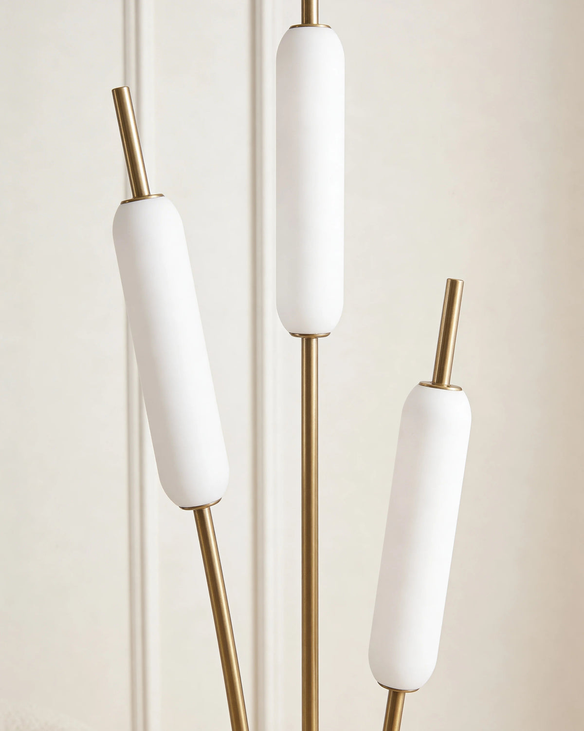 Gold LED floor lamp in a Dubai living room