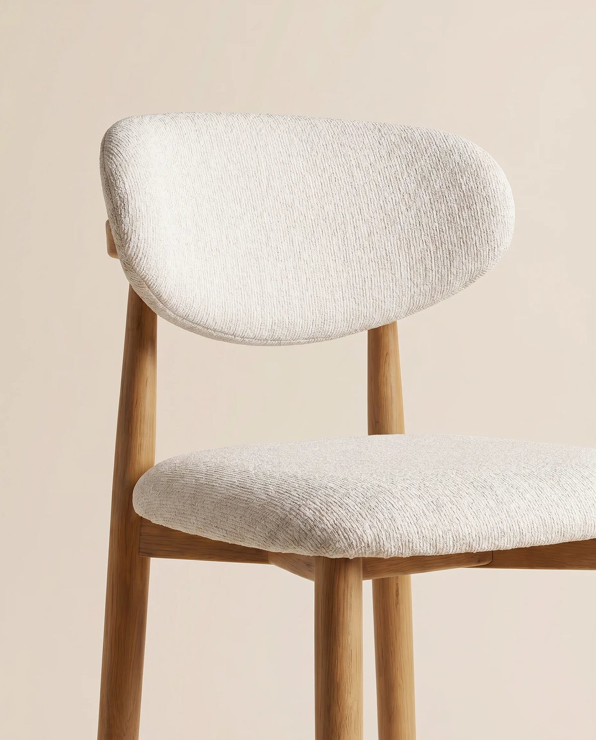 Wooden bar stool, close-up of the cushioned seat