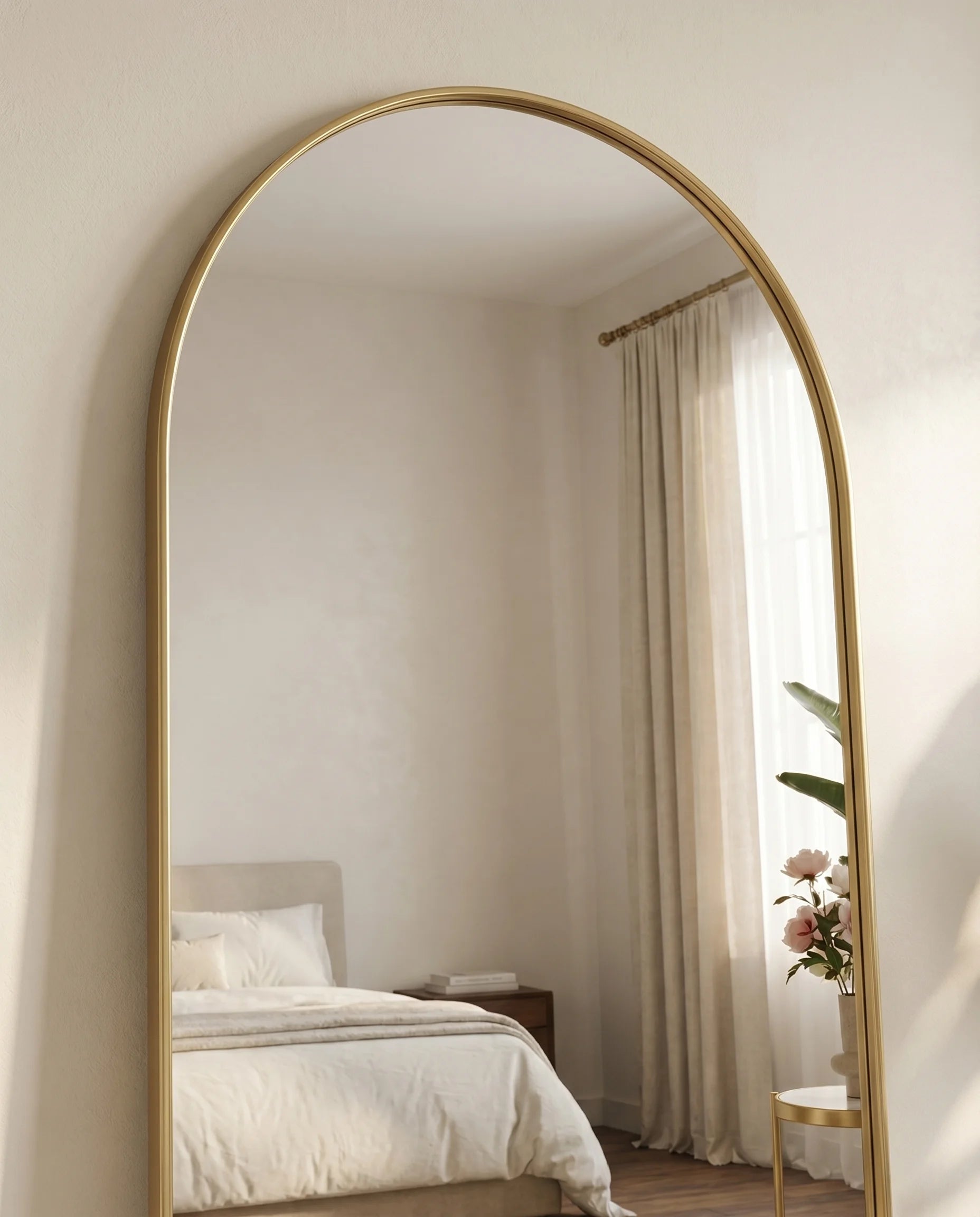 Diana gold arched wall mirror, close-up of the frame