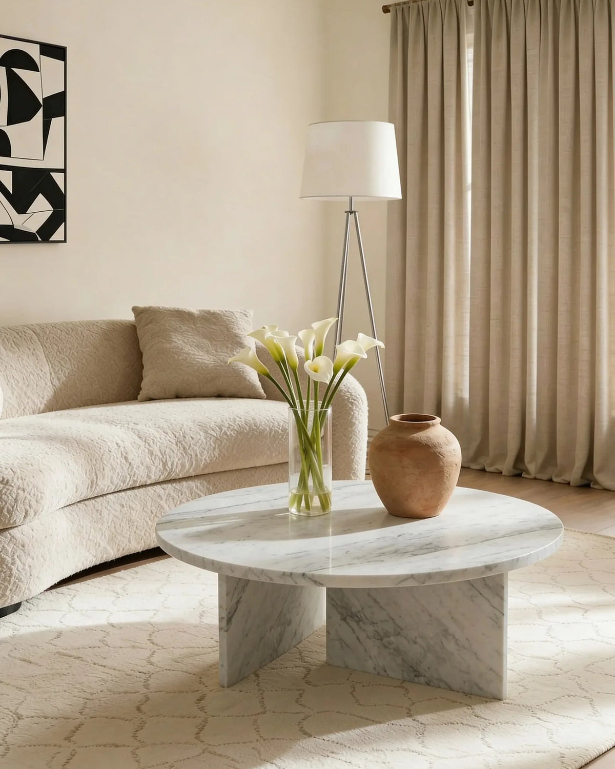 Dove Carrara marble coffee table with geometric base