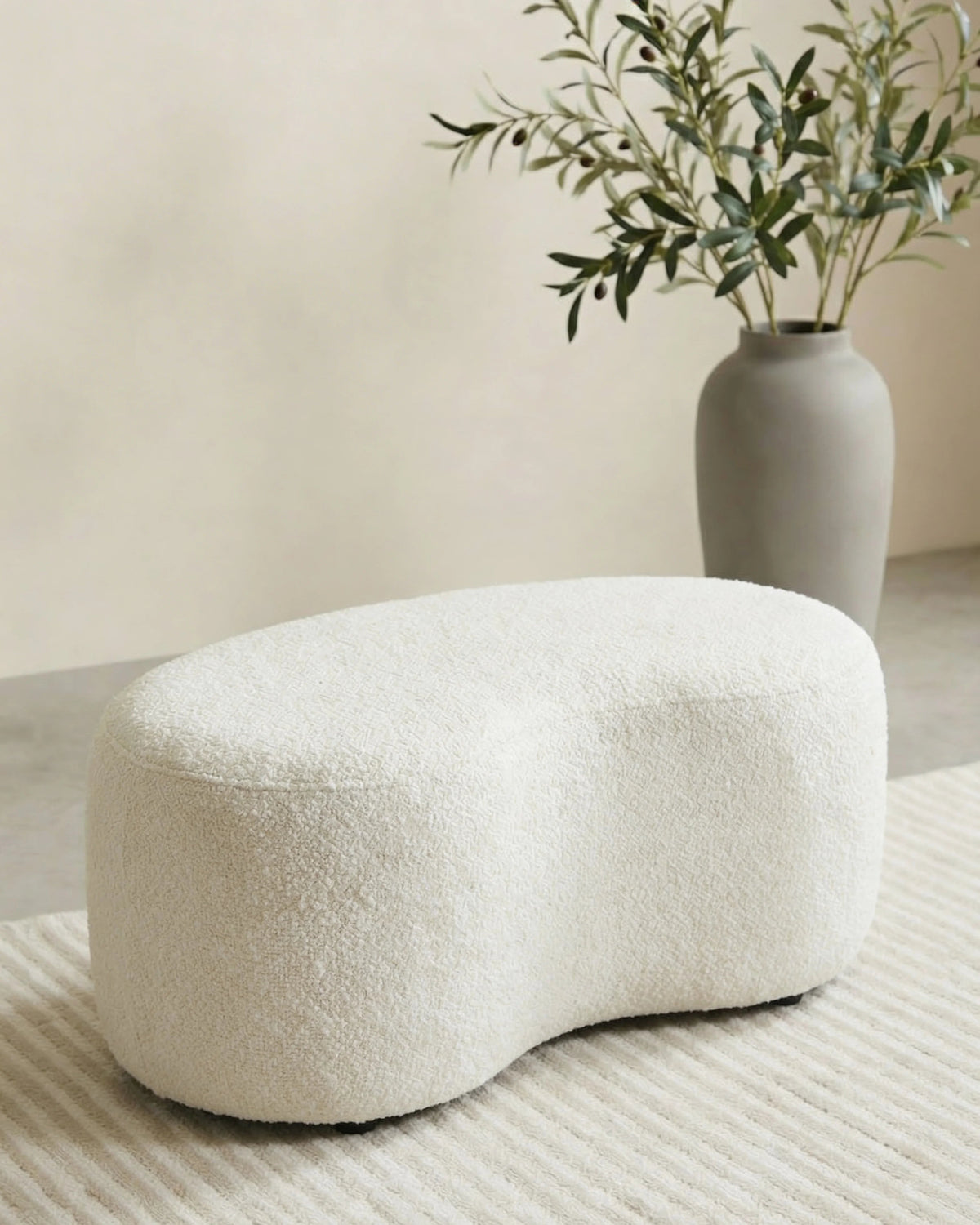 Eriska bean-shaped ottoman in a Dubai living room