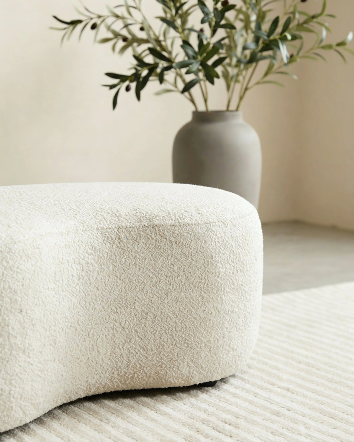 Soft bean-shaped ottoman, close-up of the upholstery