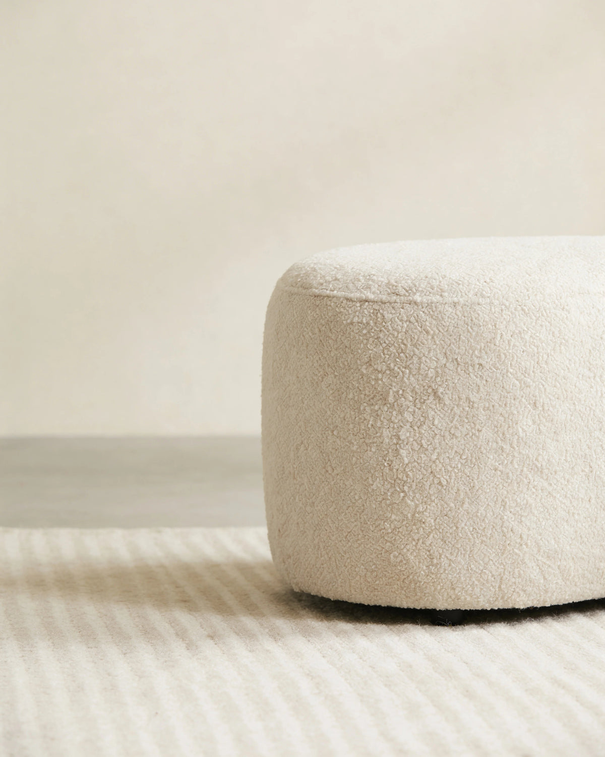Eriska bean-shaped ottoman, side view