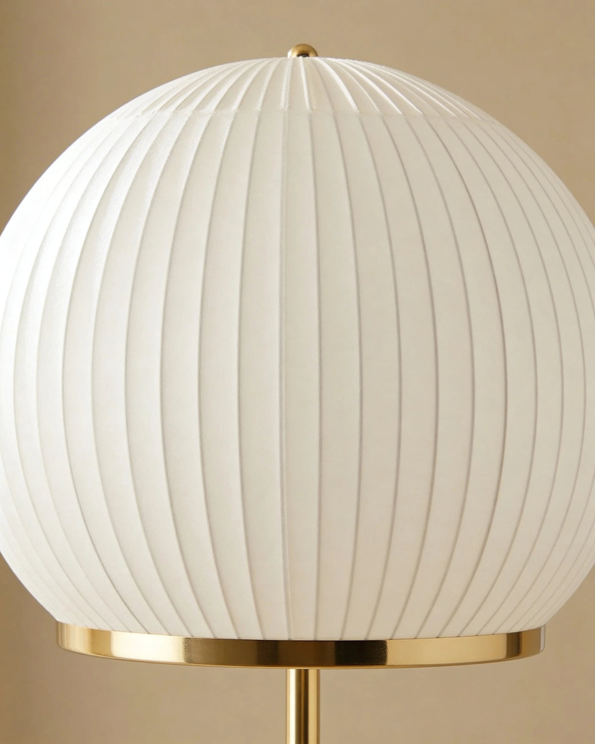 Gold corner floor lamp in a Dubai living room