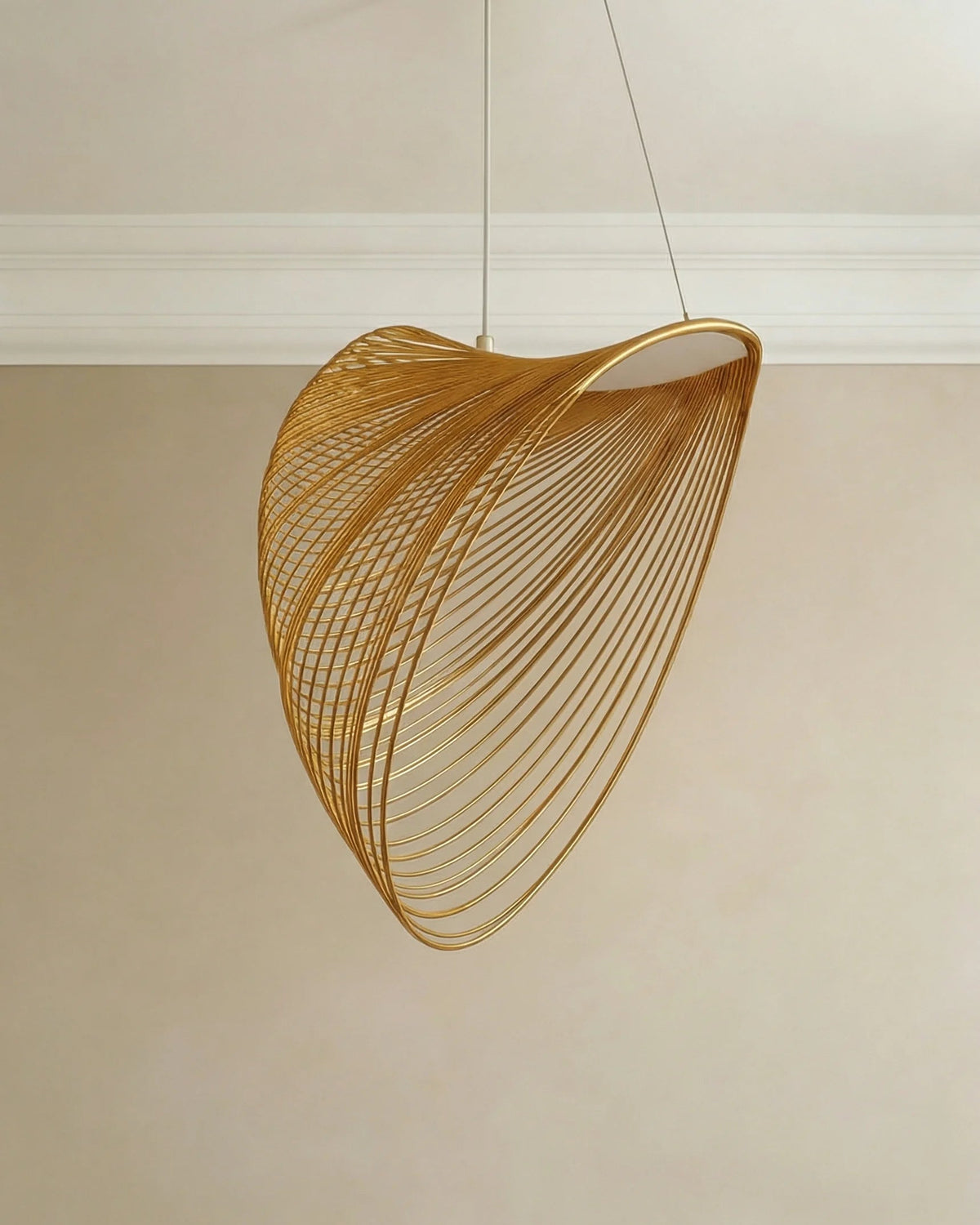 Gold pendant light in a Dubai dining room