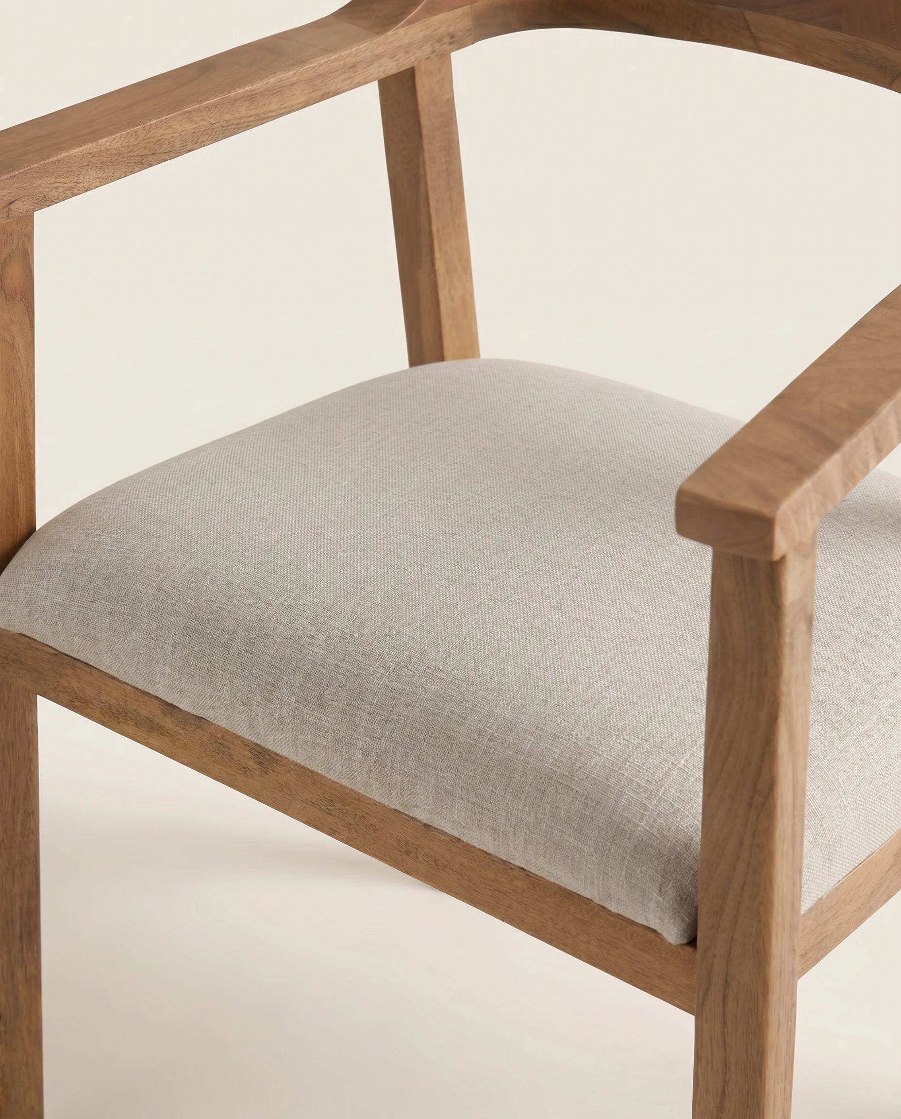 Solid wood dining chair, close-up of the padded seat
