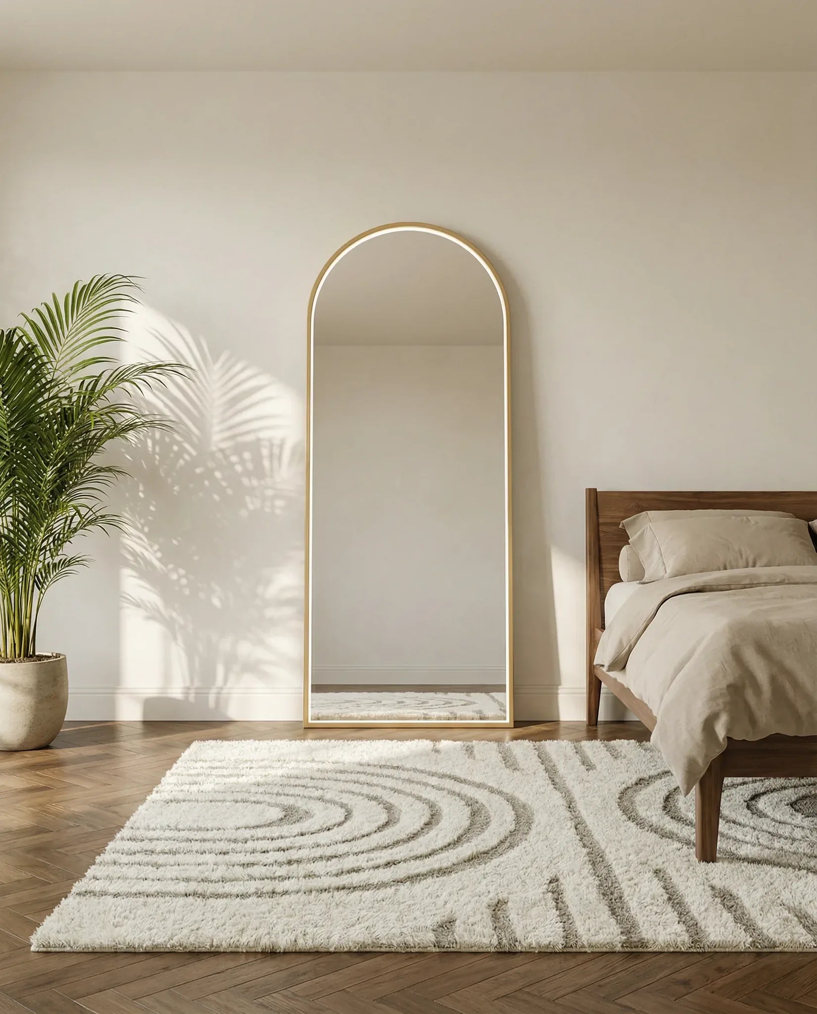Iris gold LED arch mirror in a Dubai bathroom