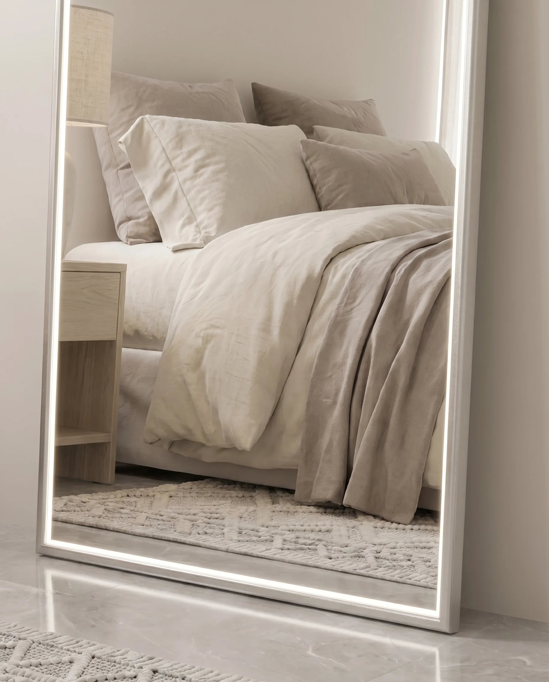 Iris silver LED arch mirror, close-up of the touch light control