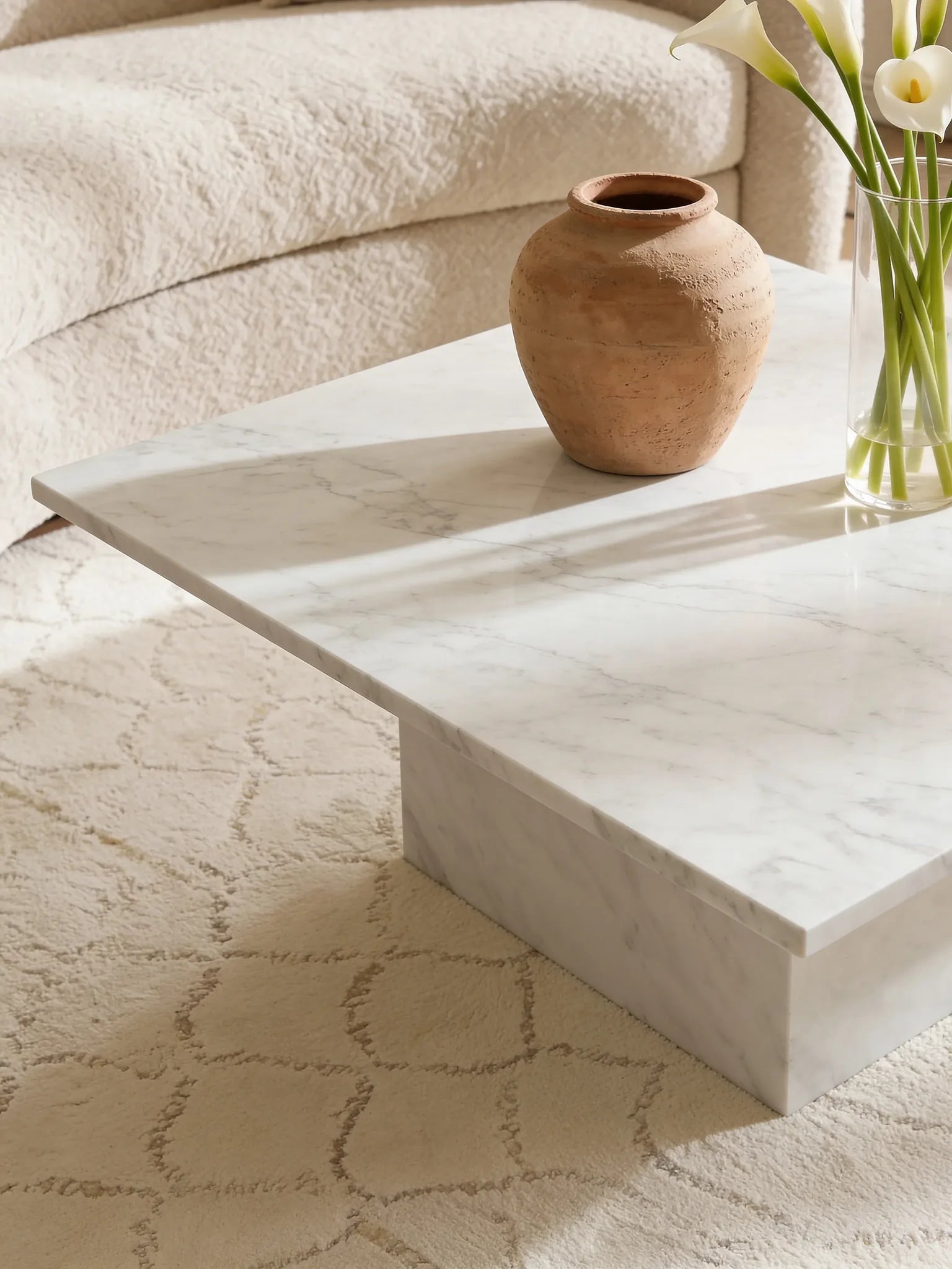 Ivory Carrara coffee table, close-up of the soft white veining