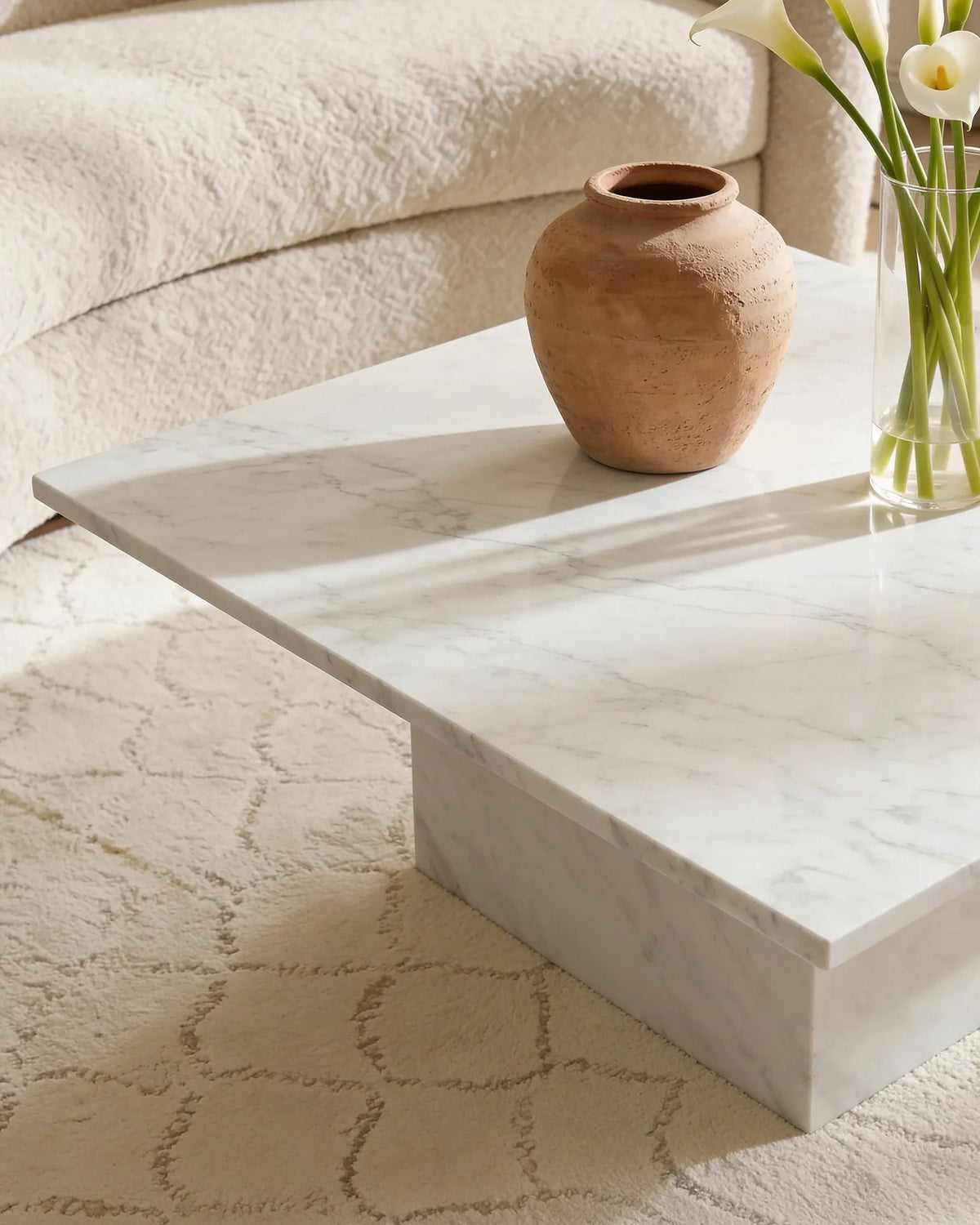 Ivory Carrara coffee table, close-up of the soft white veining