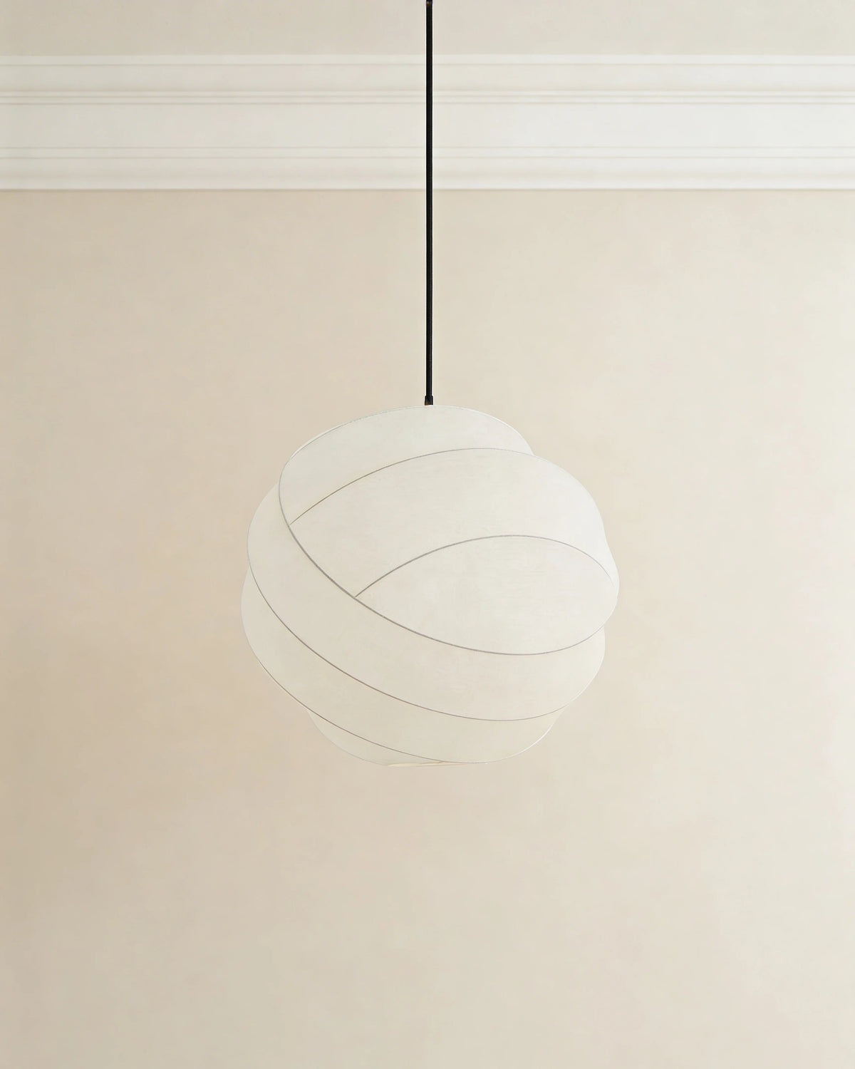Ivory silk pendant light in a Dubai bedroom
