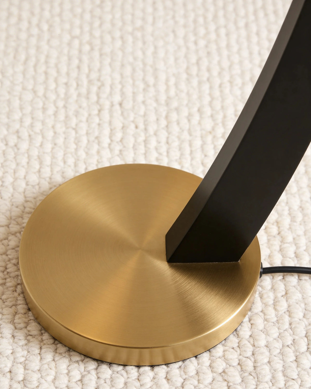 Larson adjustable black and gold arc floor lamp, close-up detail