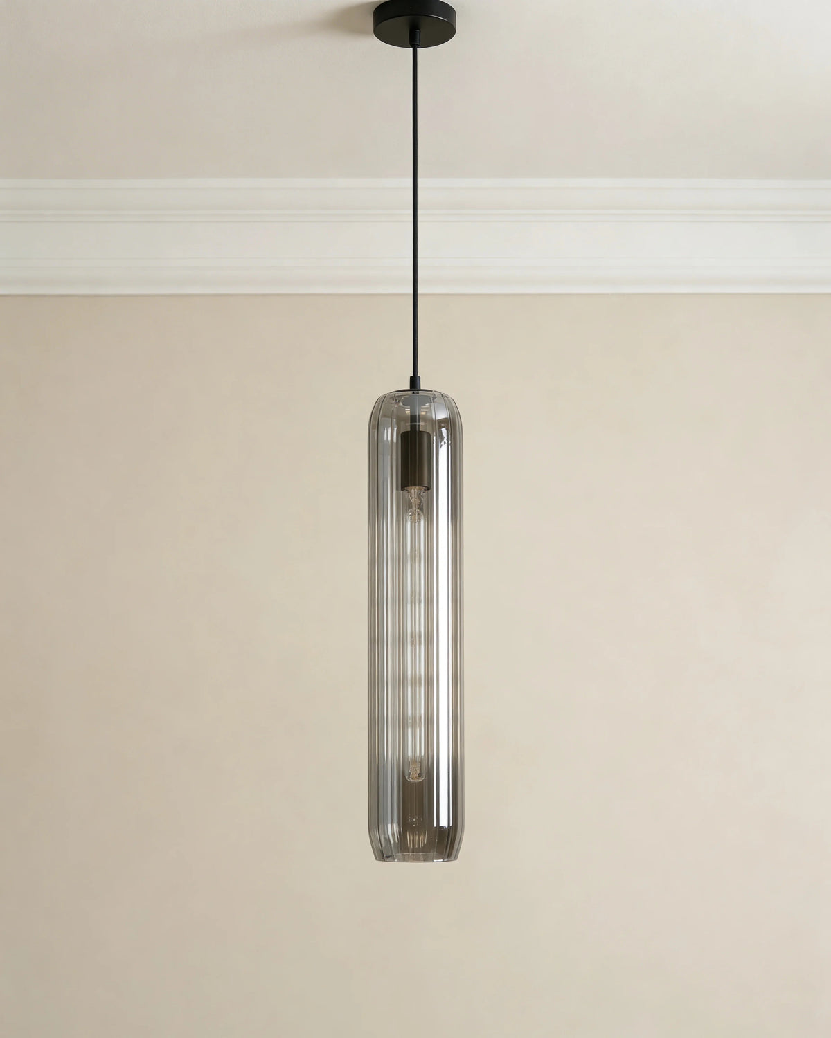 Copper pendant light in a Dubai hallway