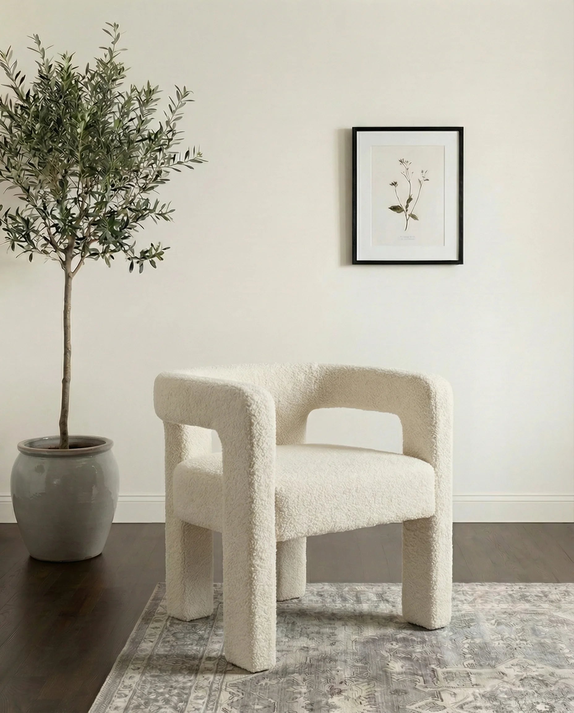 Liza ivory bouclé accent chair in a Dubai living room