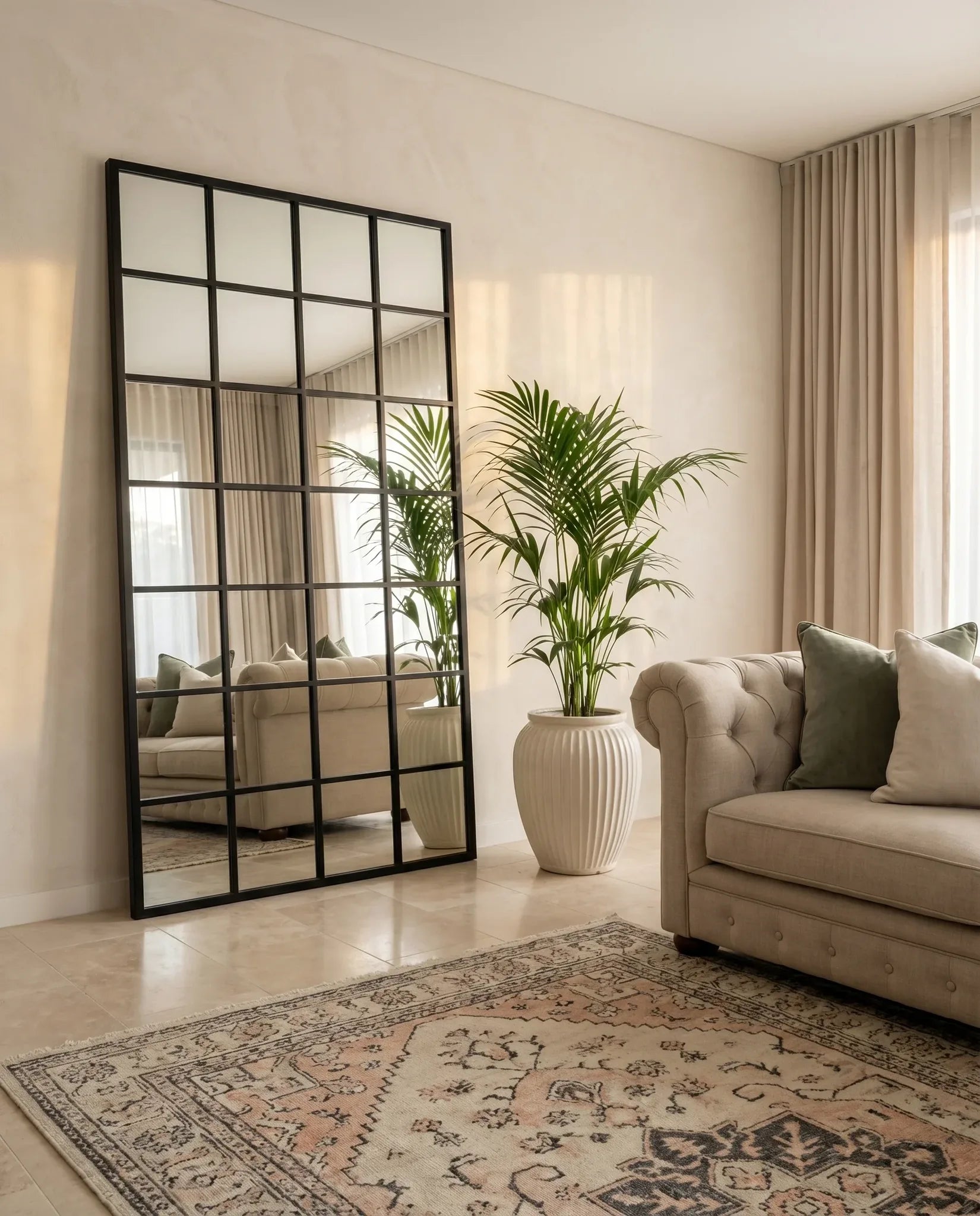 Lucia black window-pane rectangular mirror in a Dubai living room