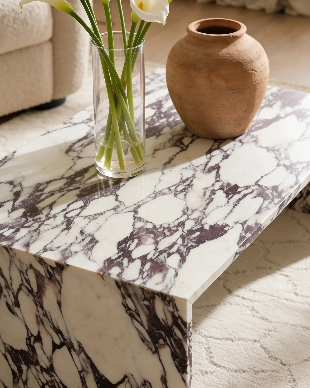 Calacatta marble coffee table, close-up of the grey veining