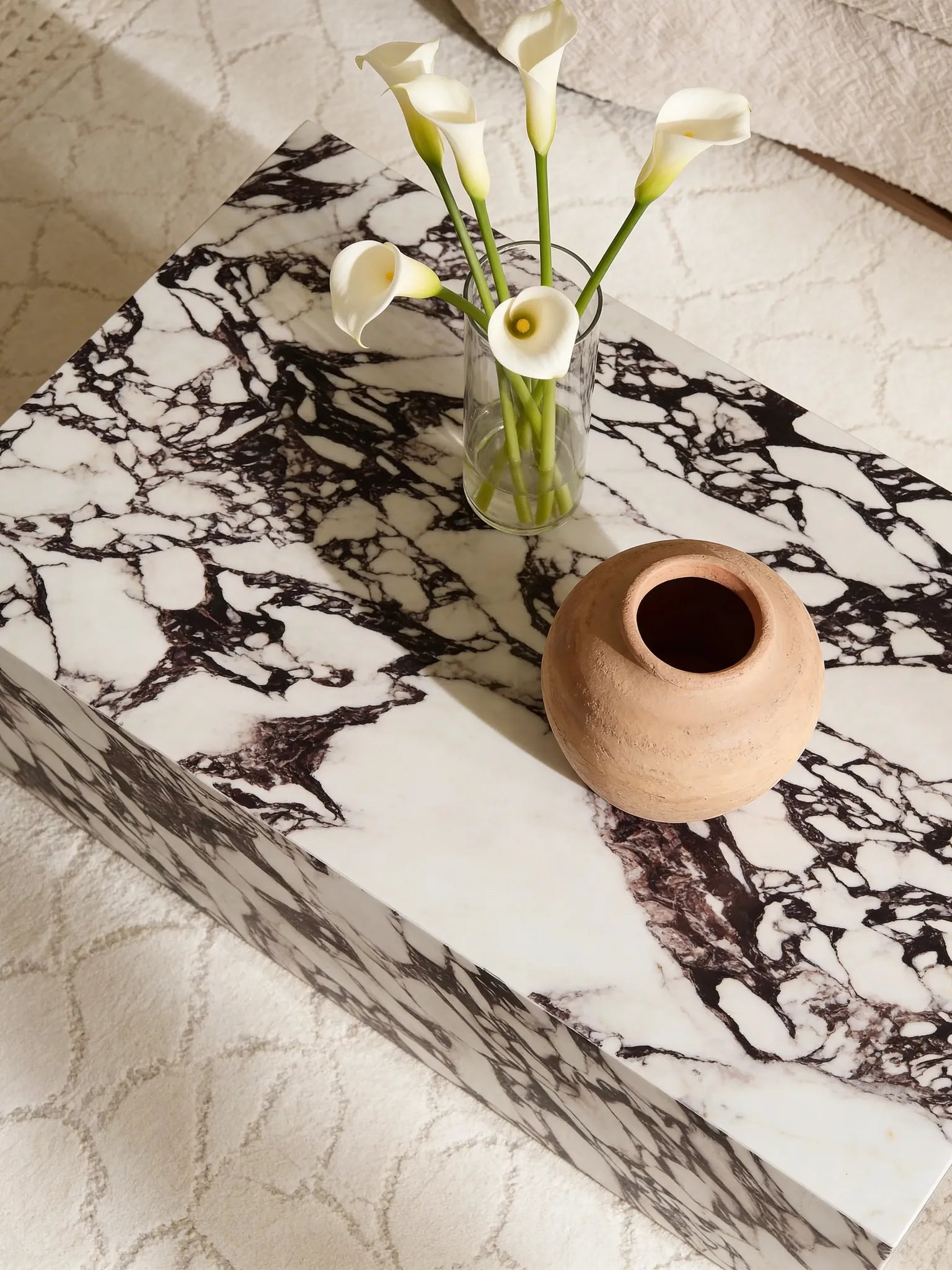 Calacatta Viola coffee table, close-up of the purple veining