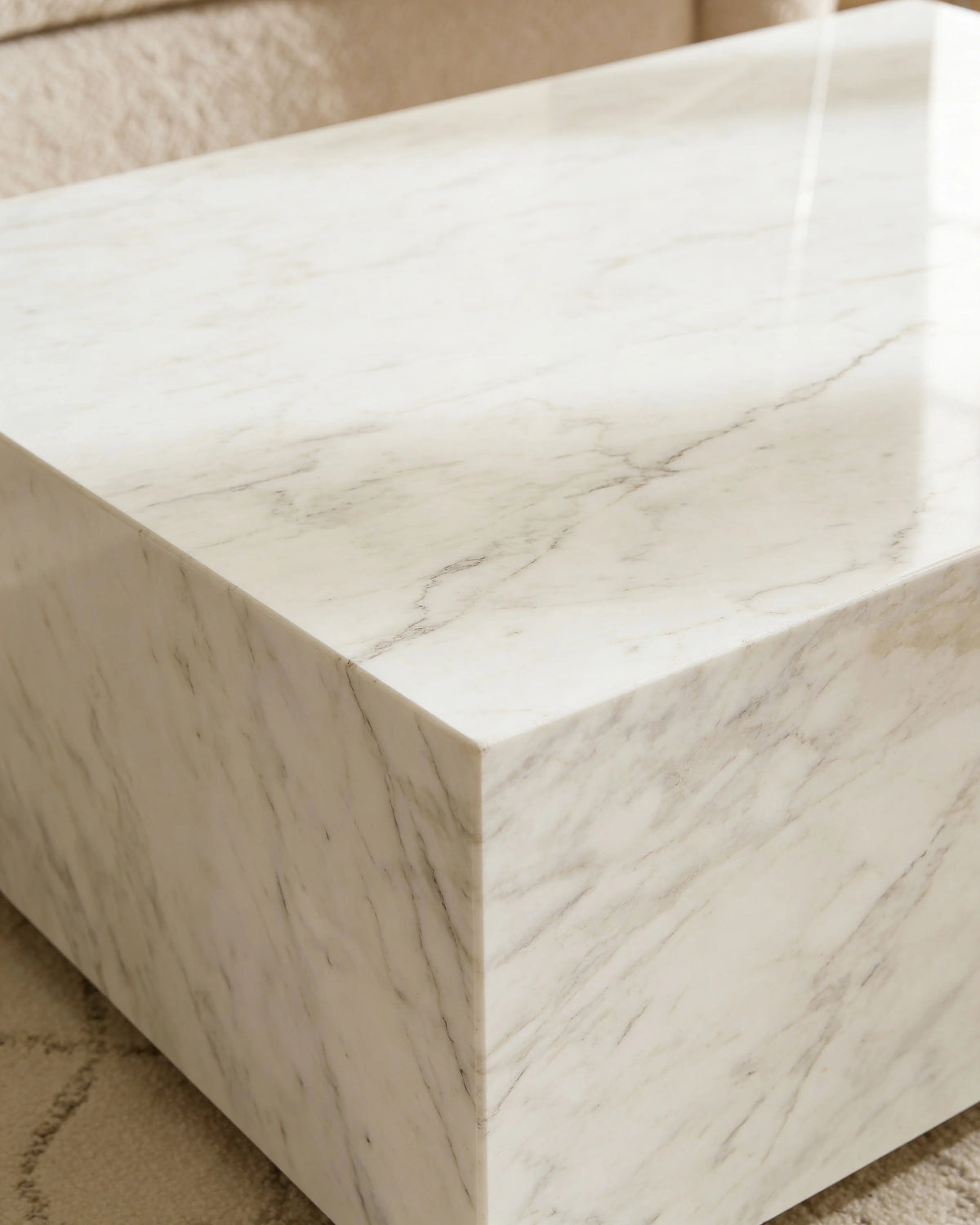 White Carrara coffee table, close-up of the bright white marble