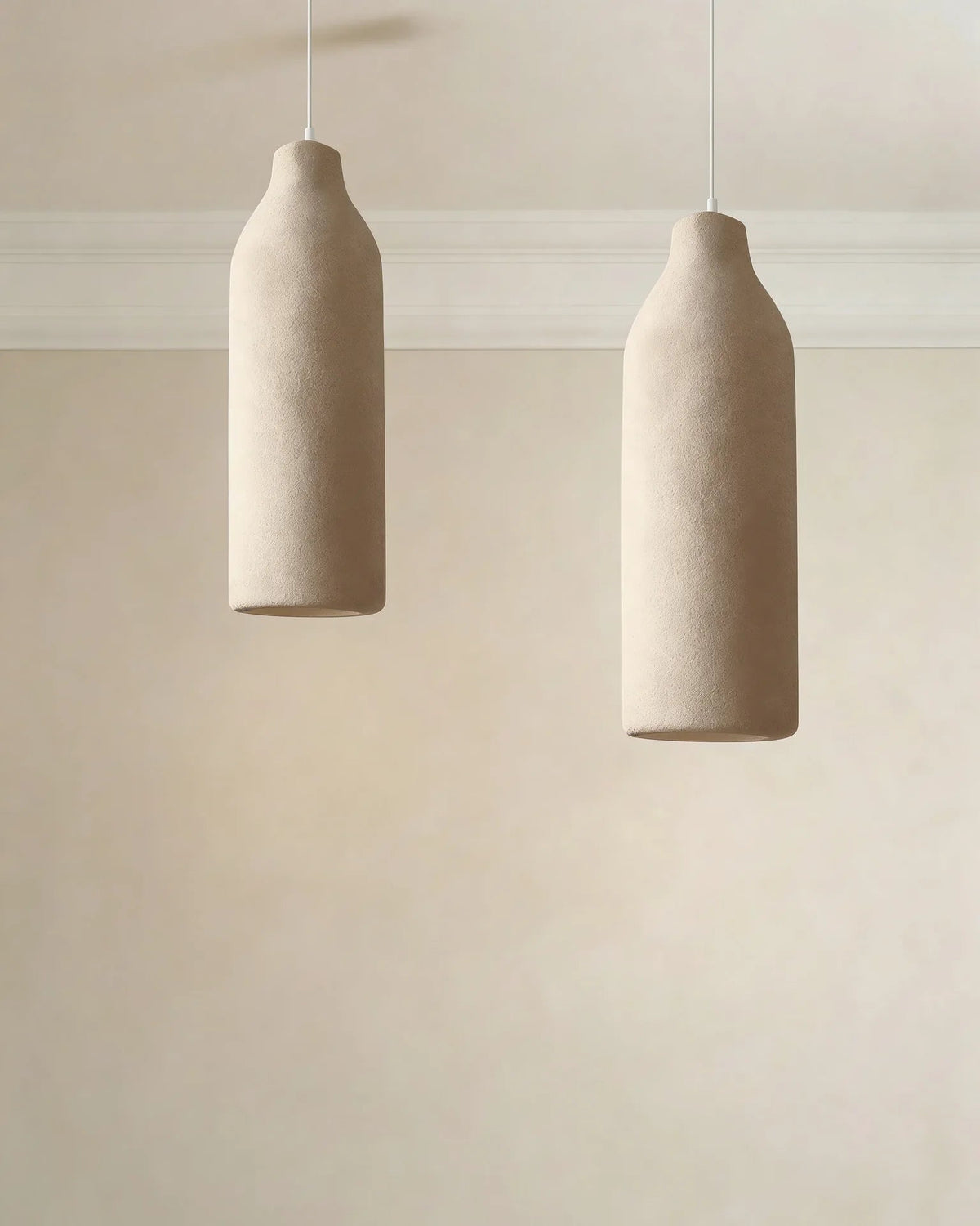 Textured pendant light in a Dubai living room