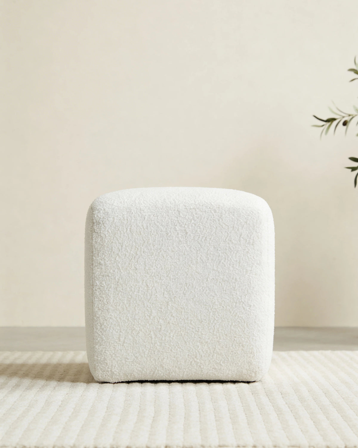Nero square pouf, side view