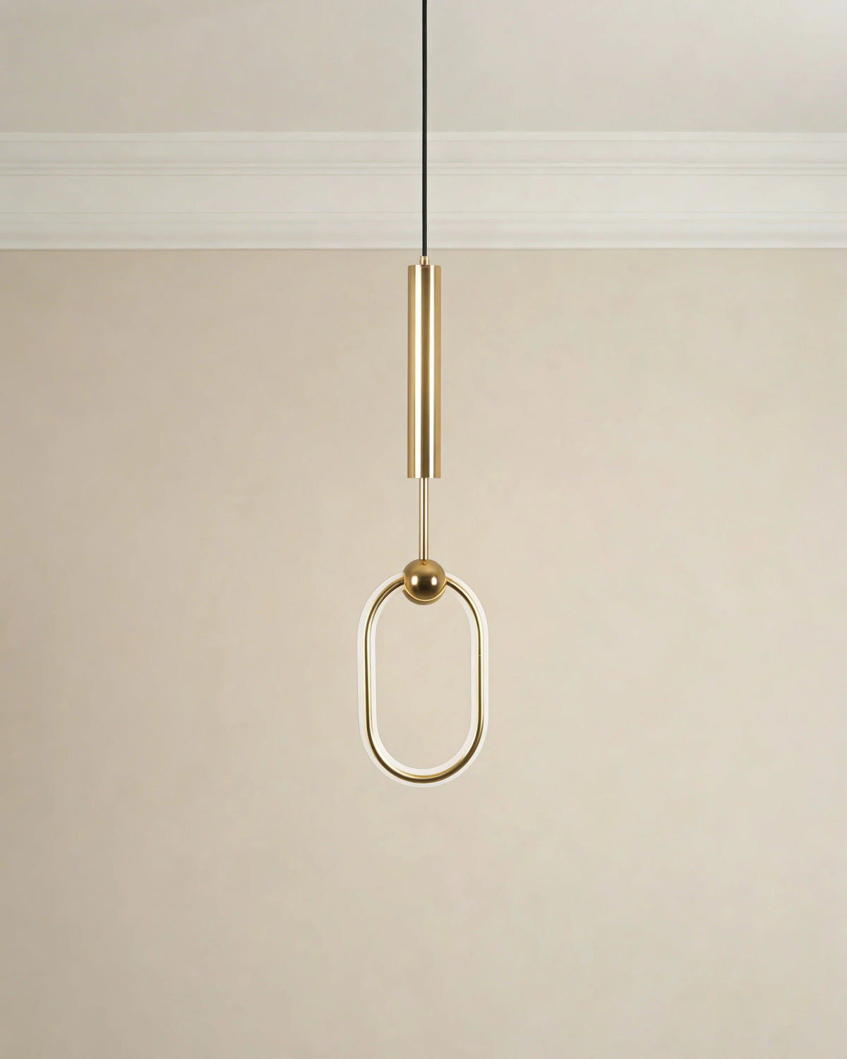 Oval LED pendant light in a Dubai bedroom