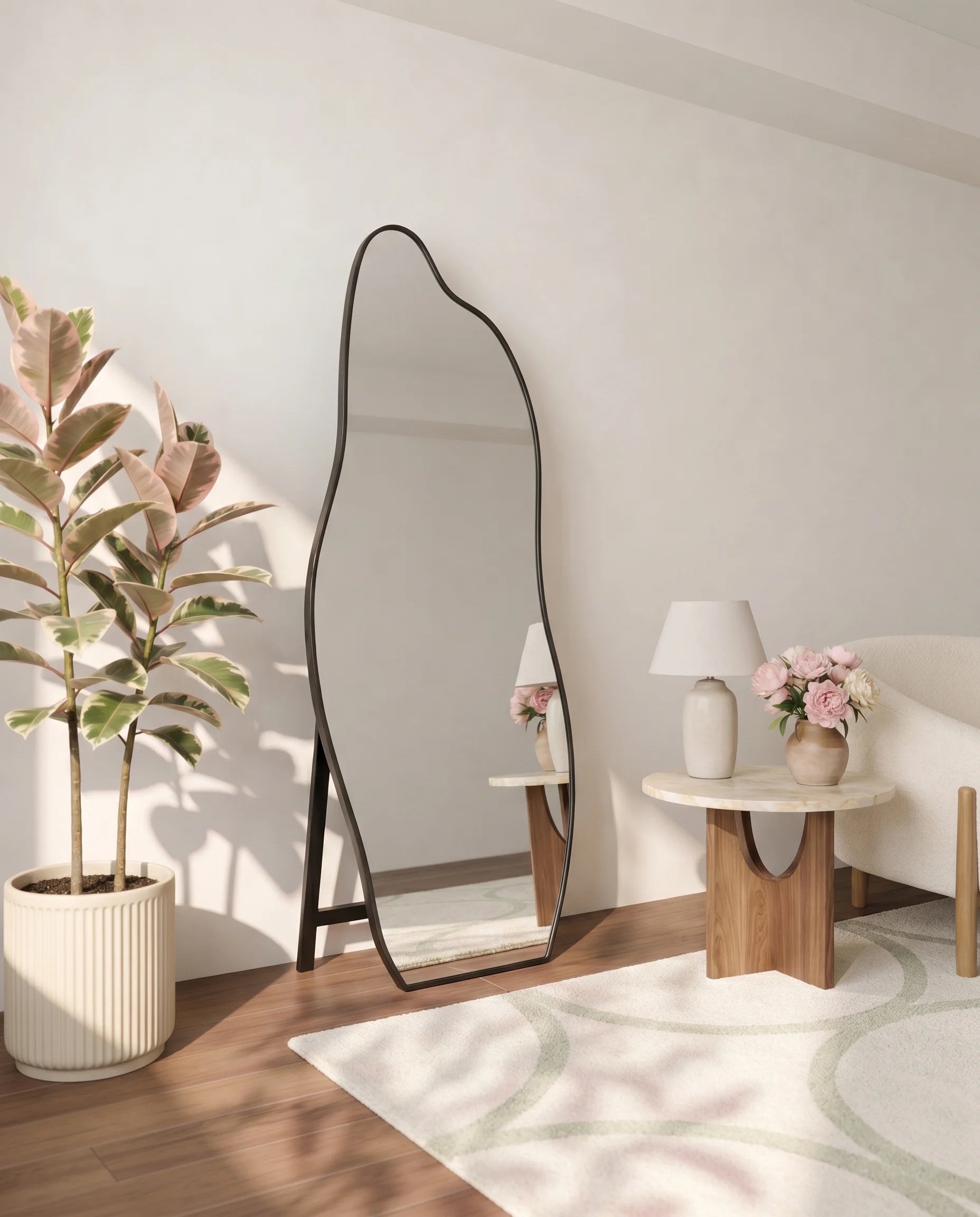 Olenna black LED irregular mirror, close-up of the lit frame