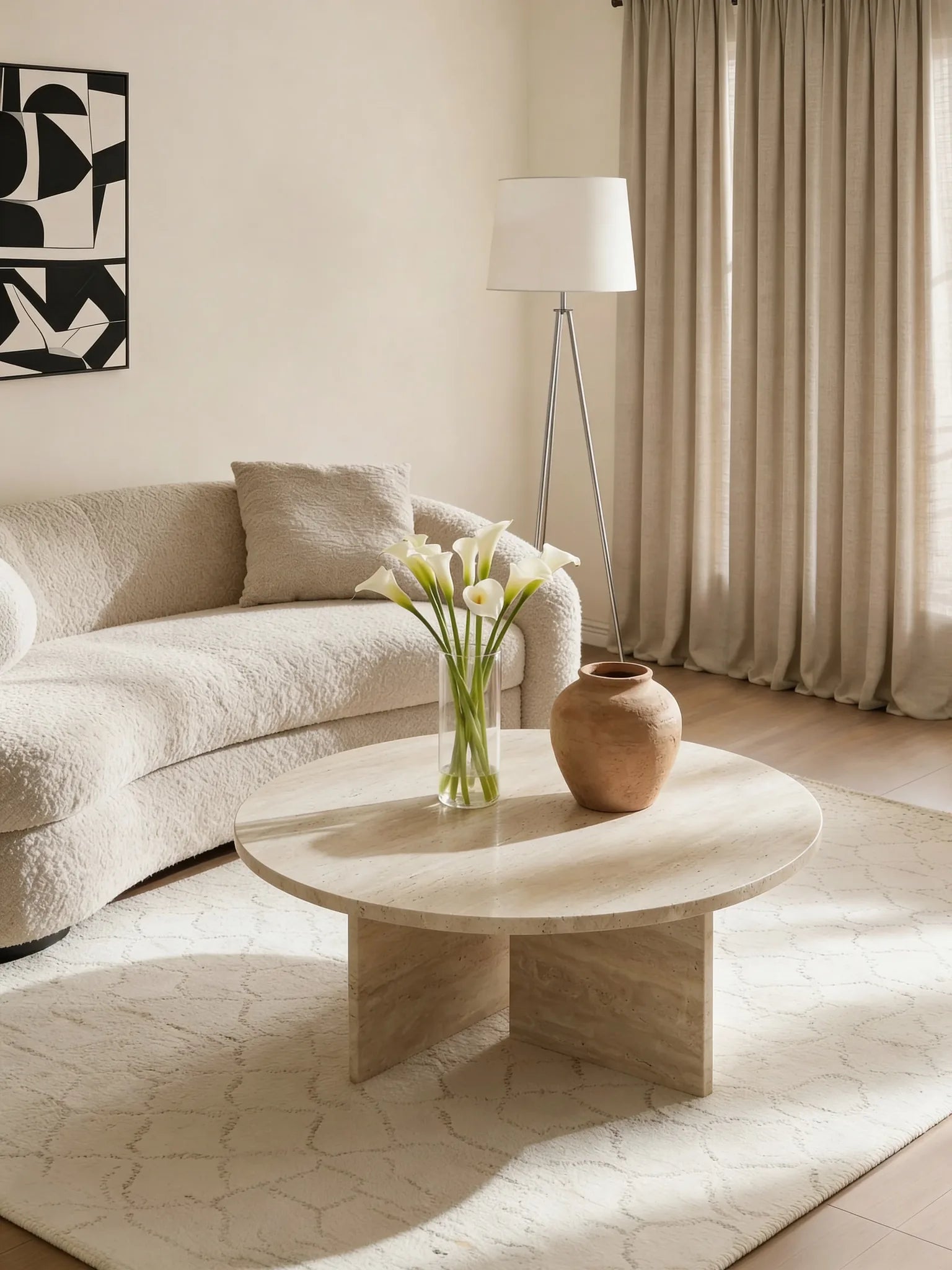 Ophelia natural travertine coffee table with geometric base