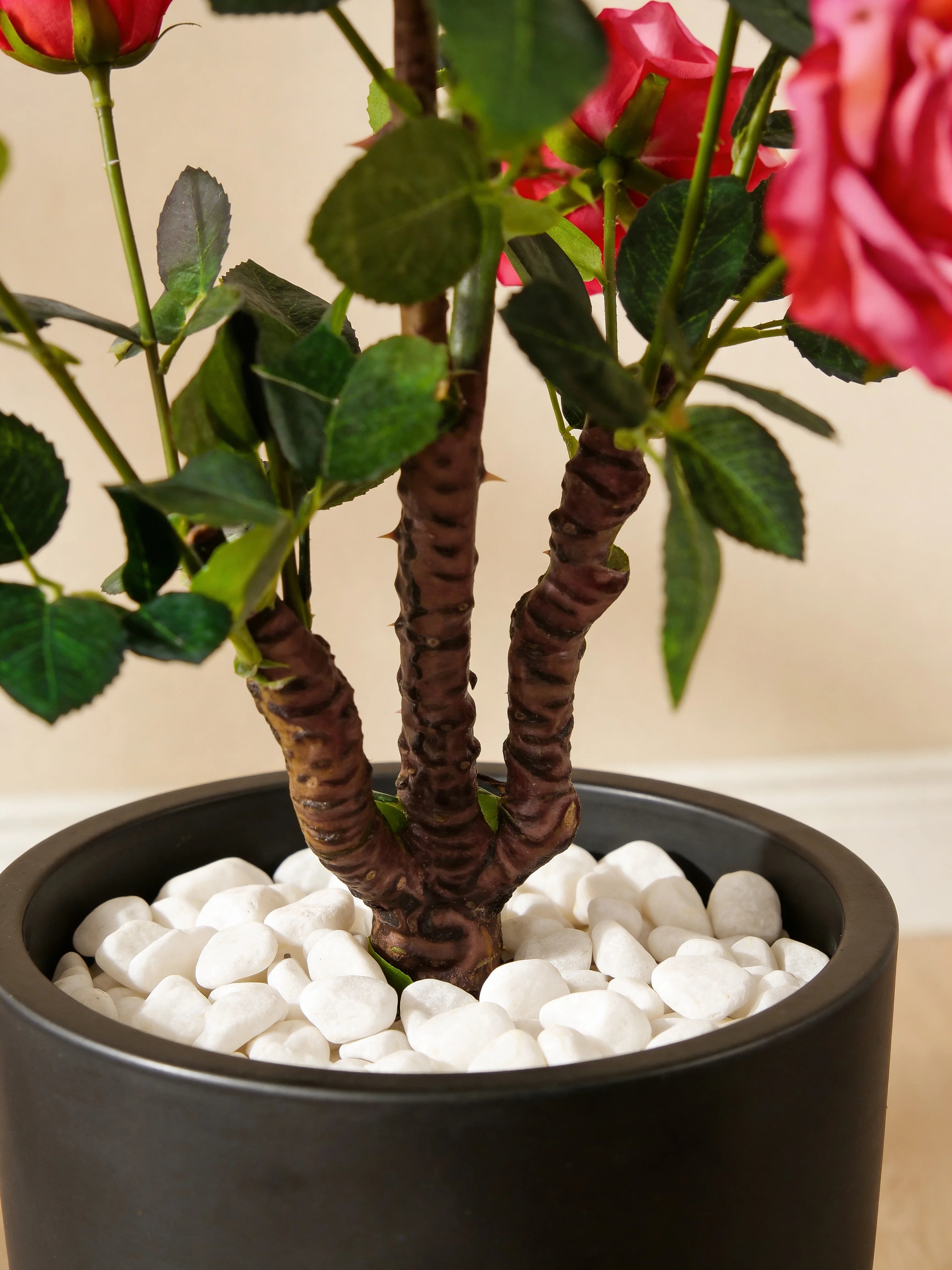 Pink rose artificial flowers in a Dubai living room