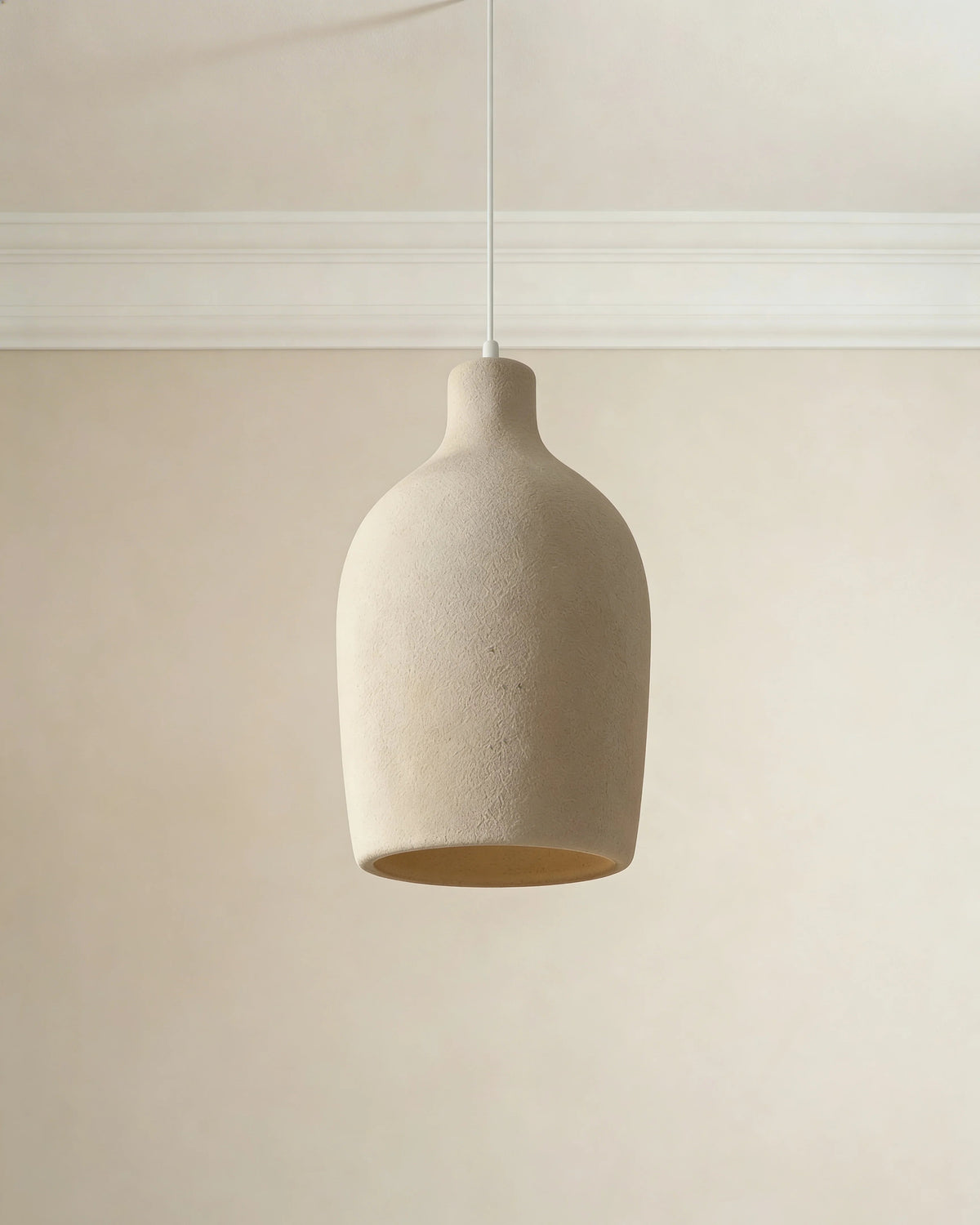 Ceramic dome pendant light in a Dubai bedroom