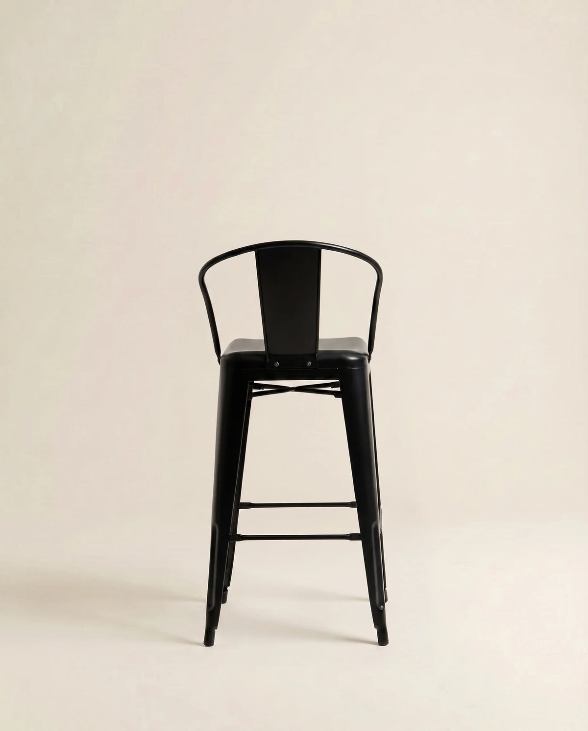 Renzo black metal bar stool at a Dubai kitchen island