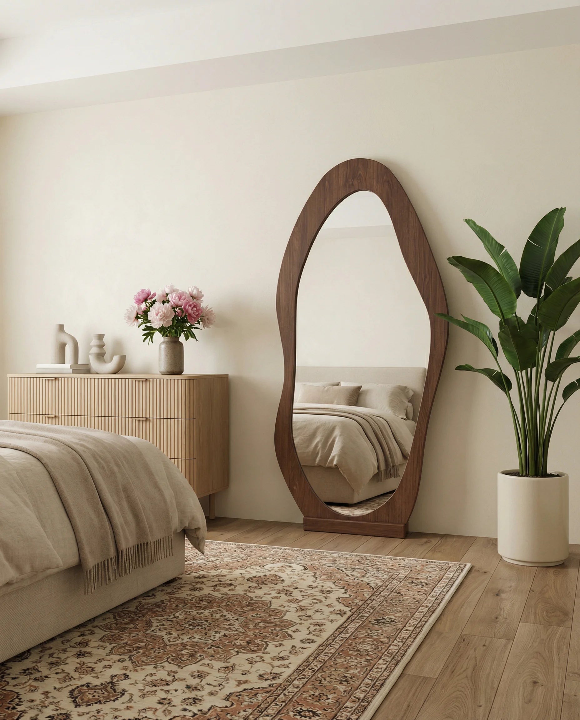 Reva wavy walnut hanging mirror on a Dubai feature wall