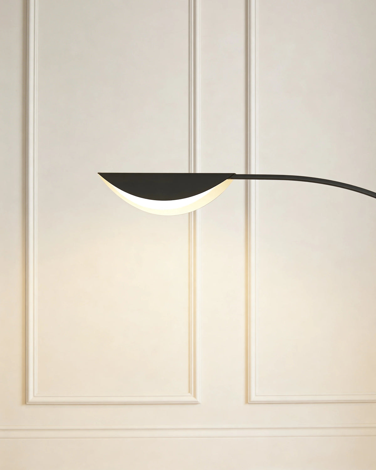 Tall arc floor lamp in a Dubai living room