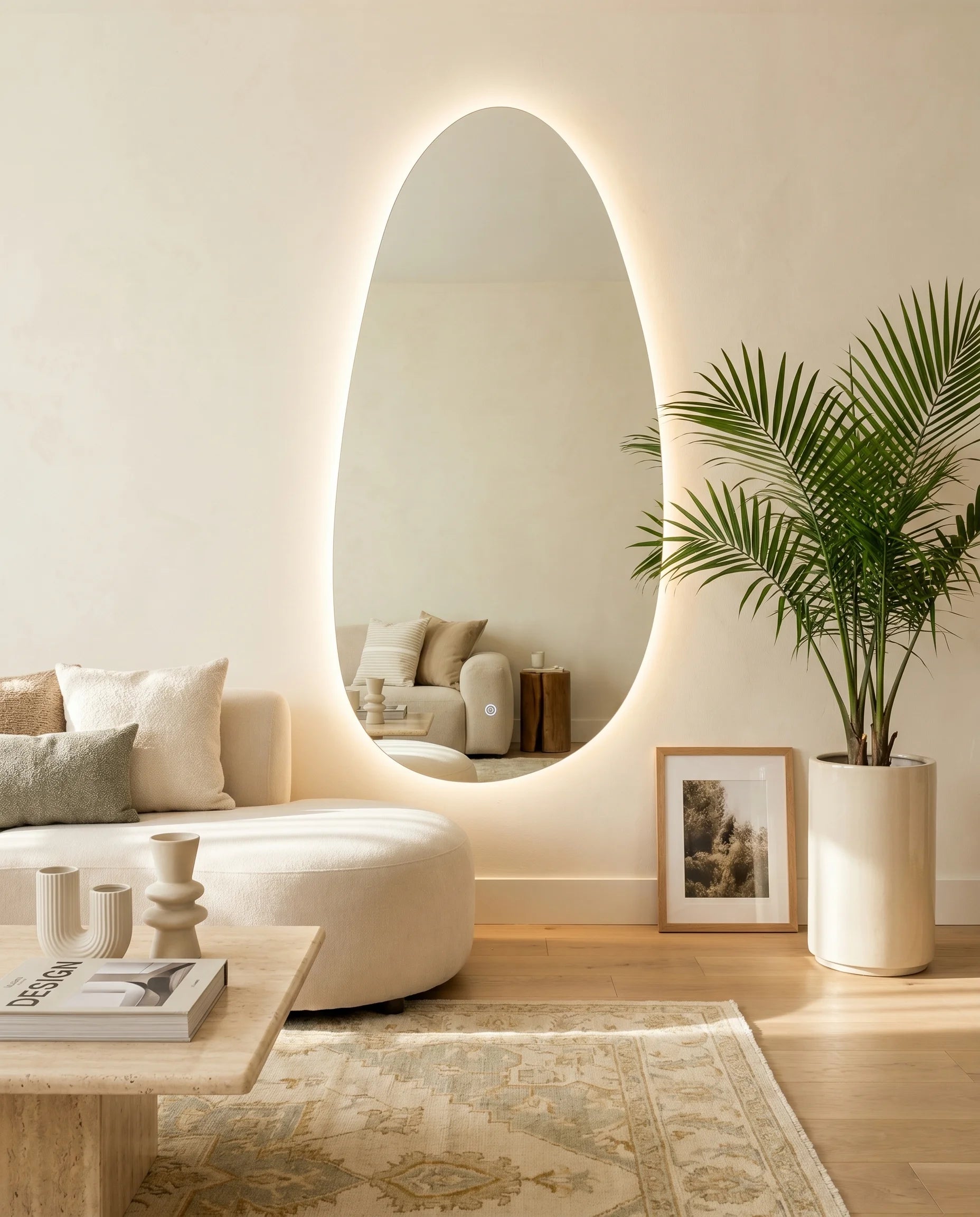 Salma lighted frameless freeform mirror on a Dubai feature wall