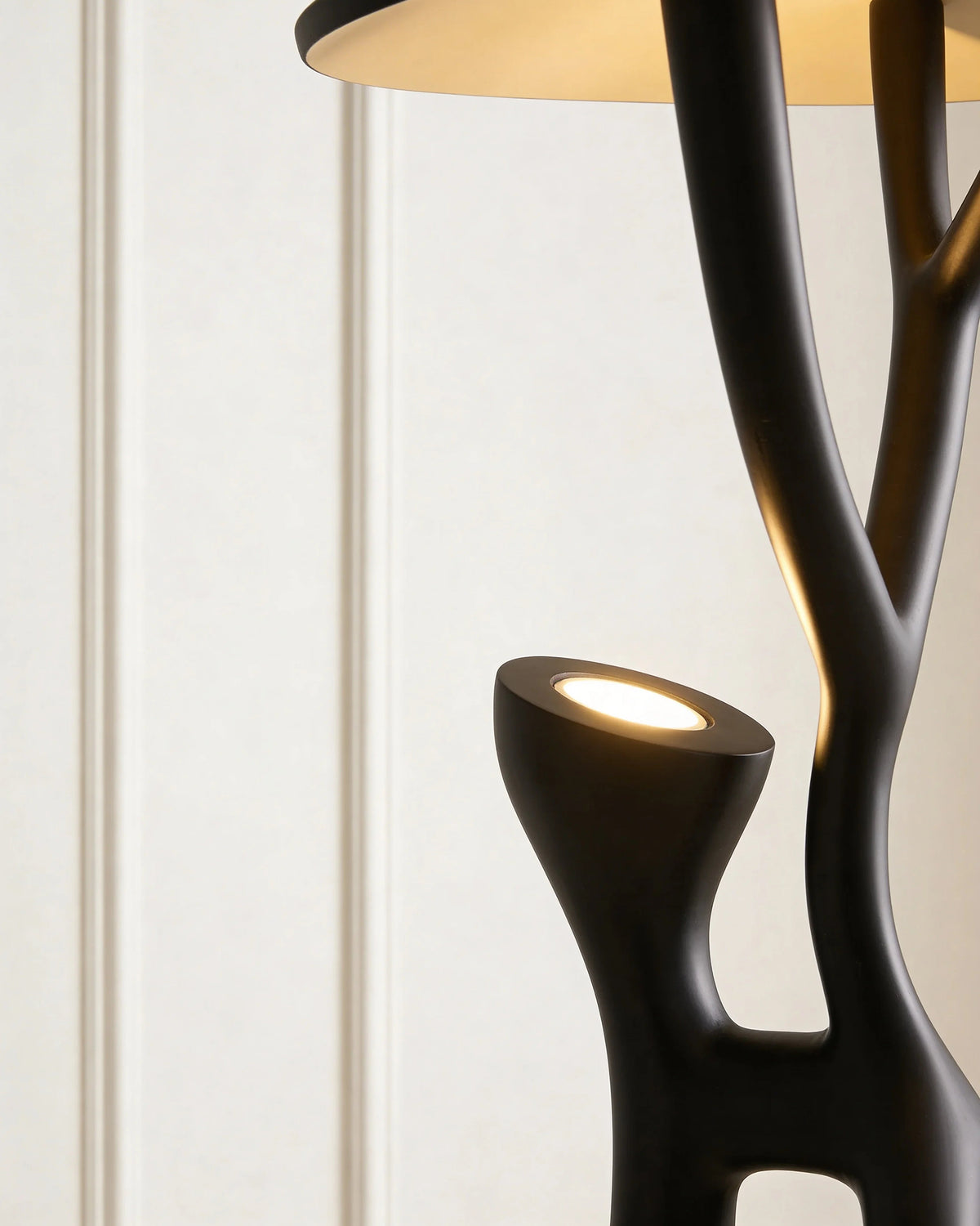 Sculptural floor lamp in a Dubai living room