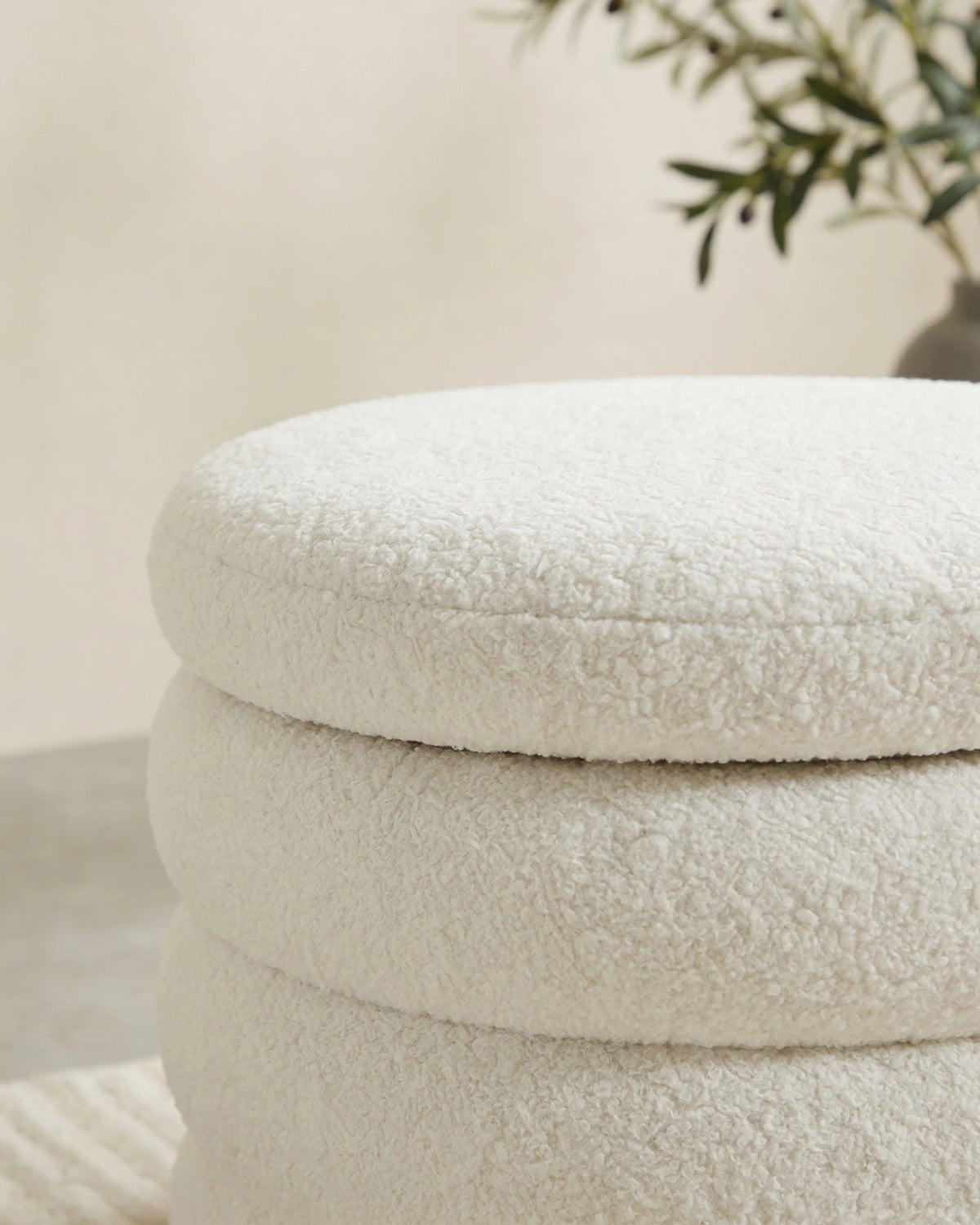 Sherpa wide vault pouf, side view