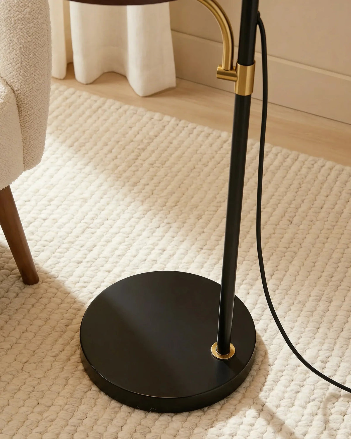 Silas black and copper arched shelf floor lamp, close-up detail